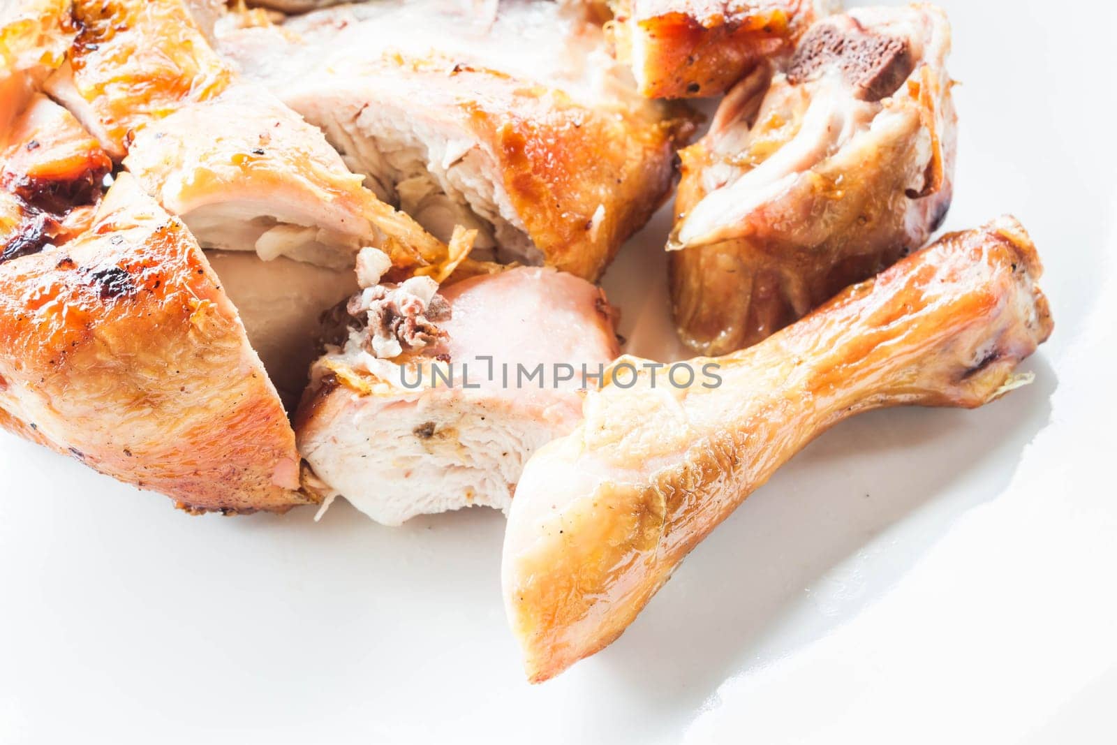 Homemade chicken grilled on plate, stock photo