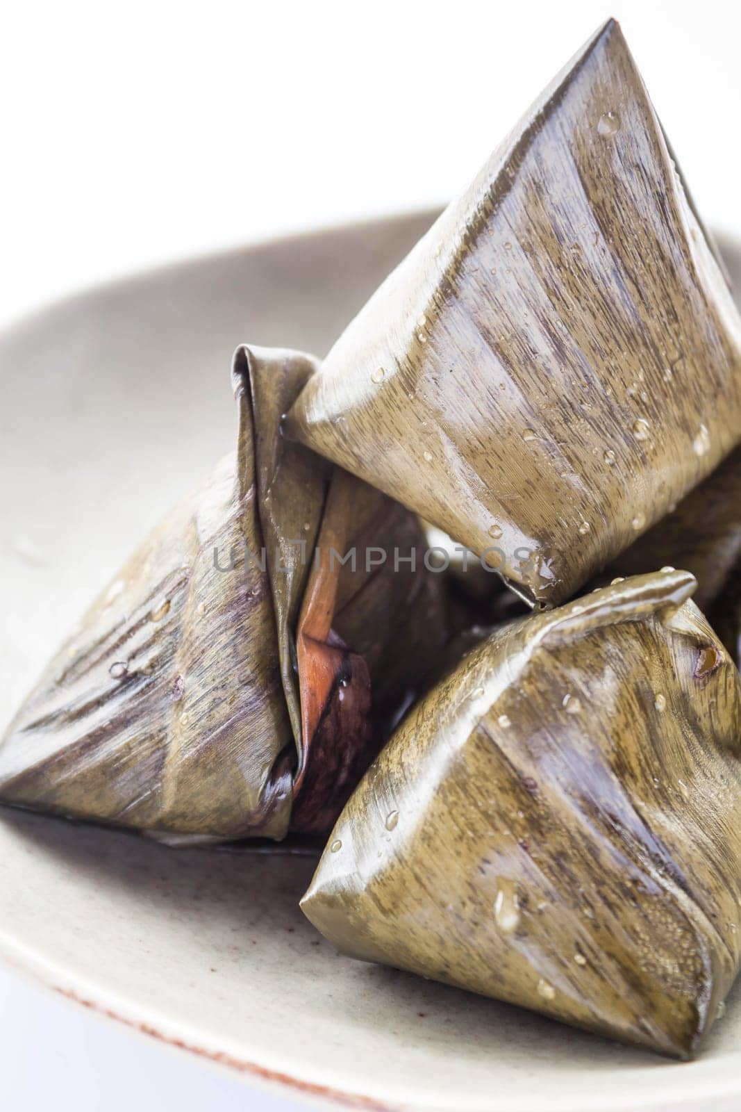 Close up stuffed dough pyramid dessert, stock photo