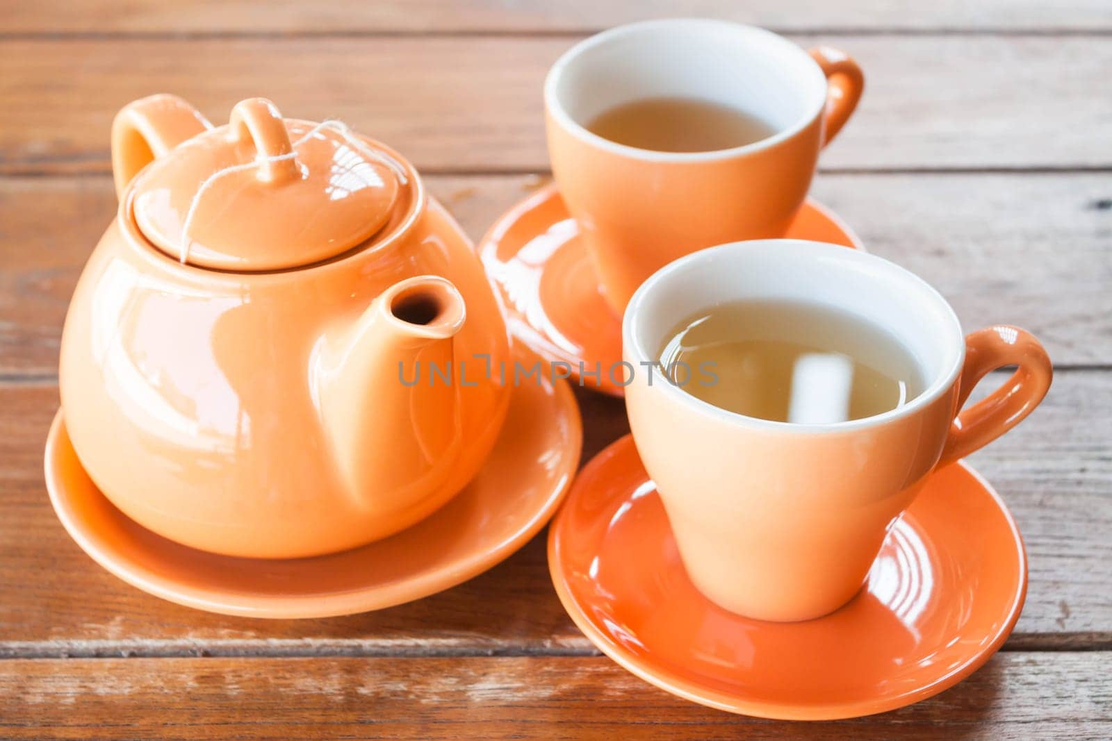 Hot tea with ceramic cups and pot, stock photo