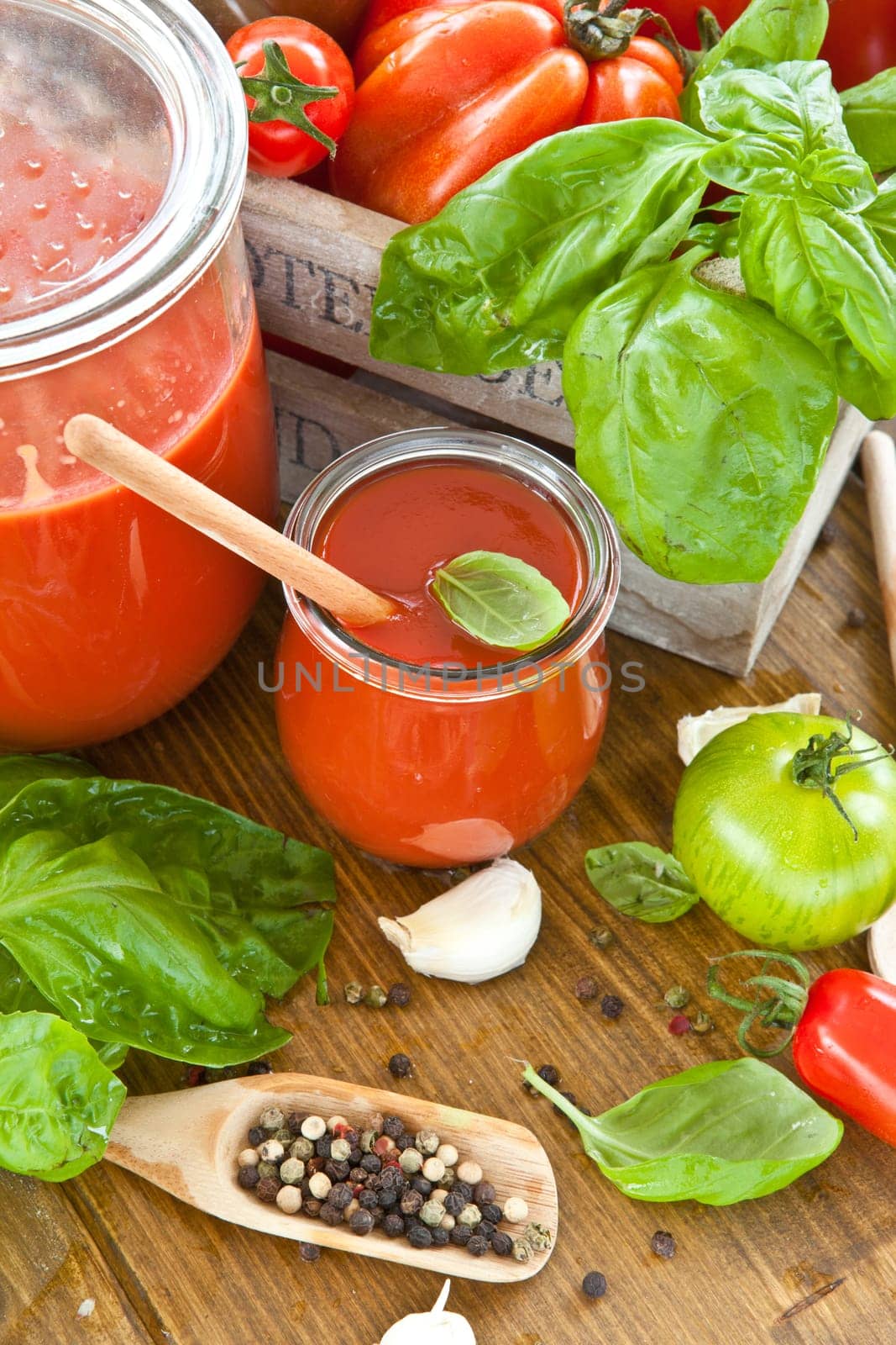 Homemade tomato sauce with fresh tomatoes and kraeuterns