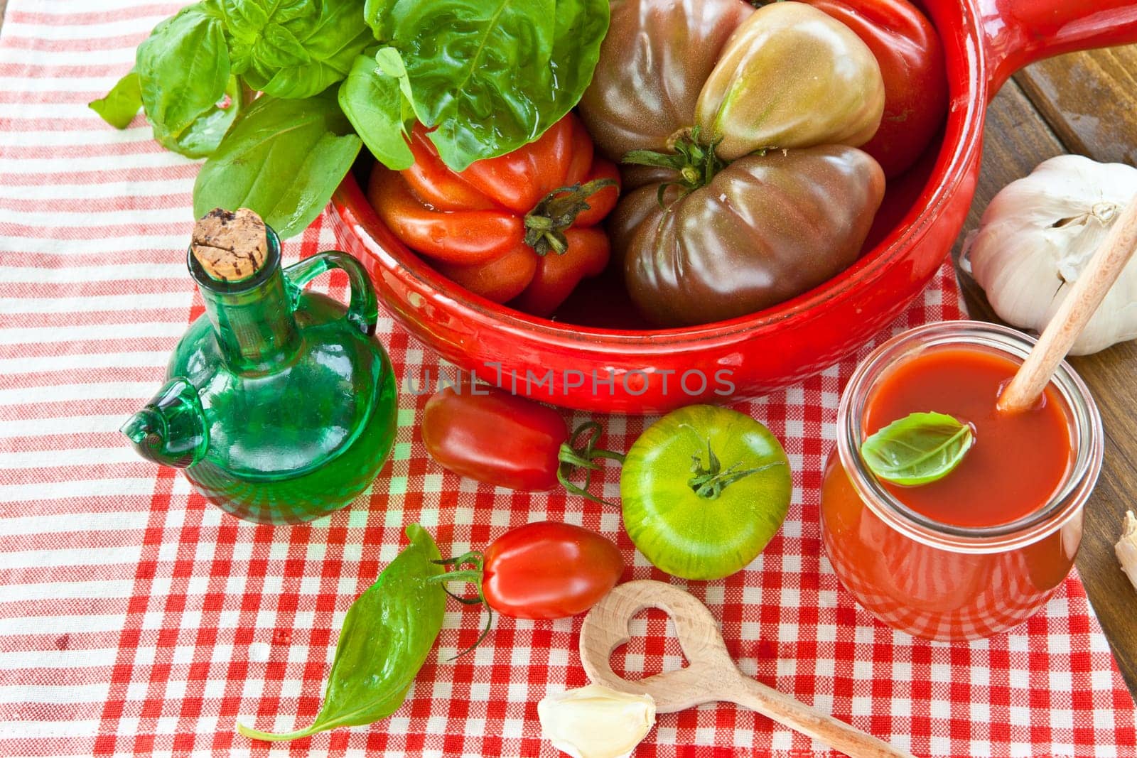 Homemade tomato sauce with fresh tomatoes and kraeuterns