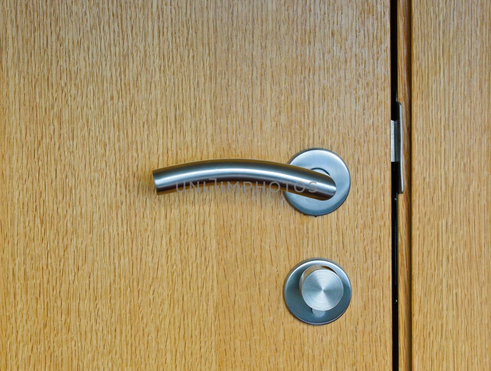 Modren style door handle on wooden door