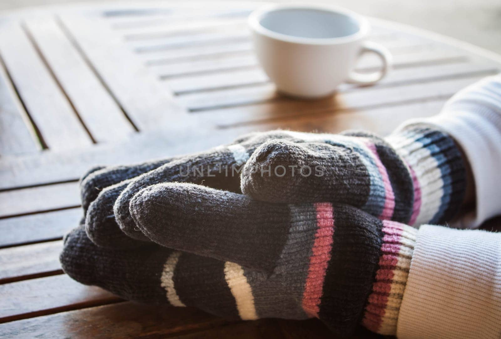 Coffee bar customer hands in winter, stock photo