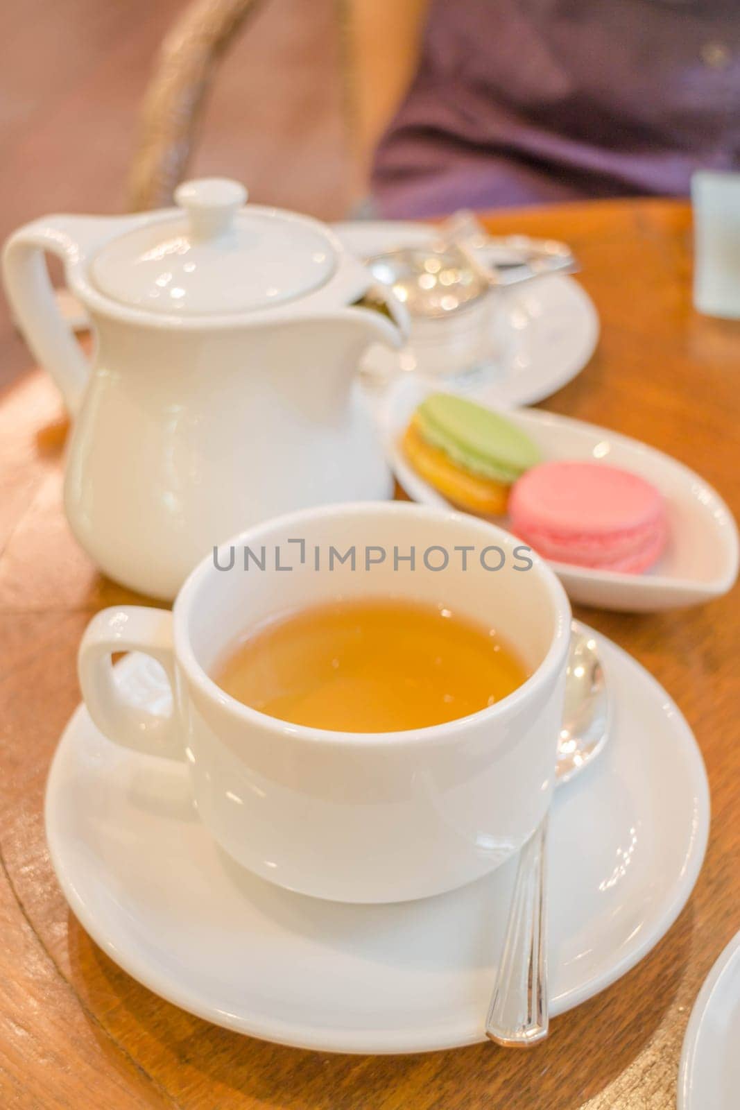 Set of hot tea with macaroon, stock photo