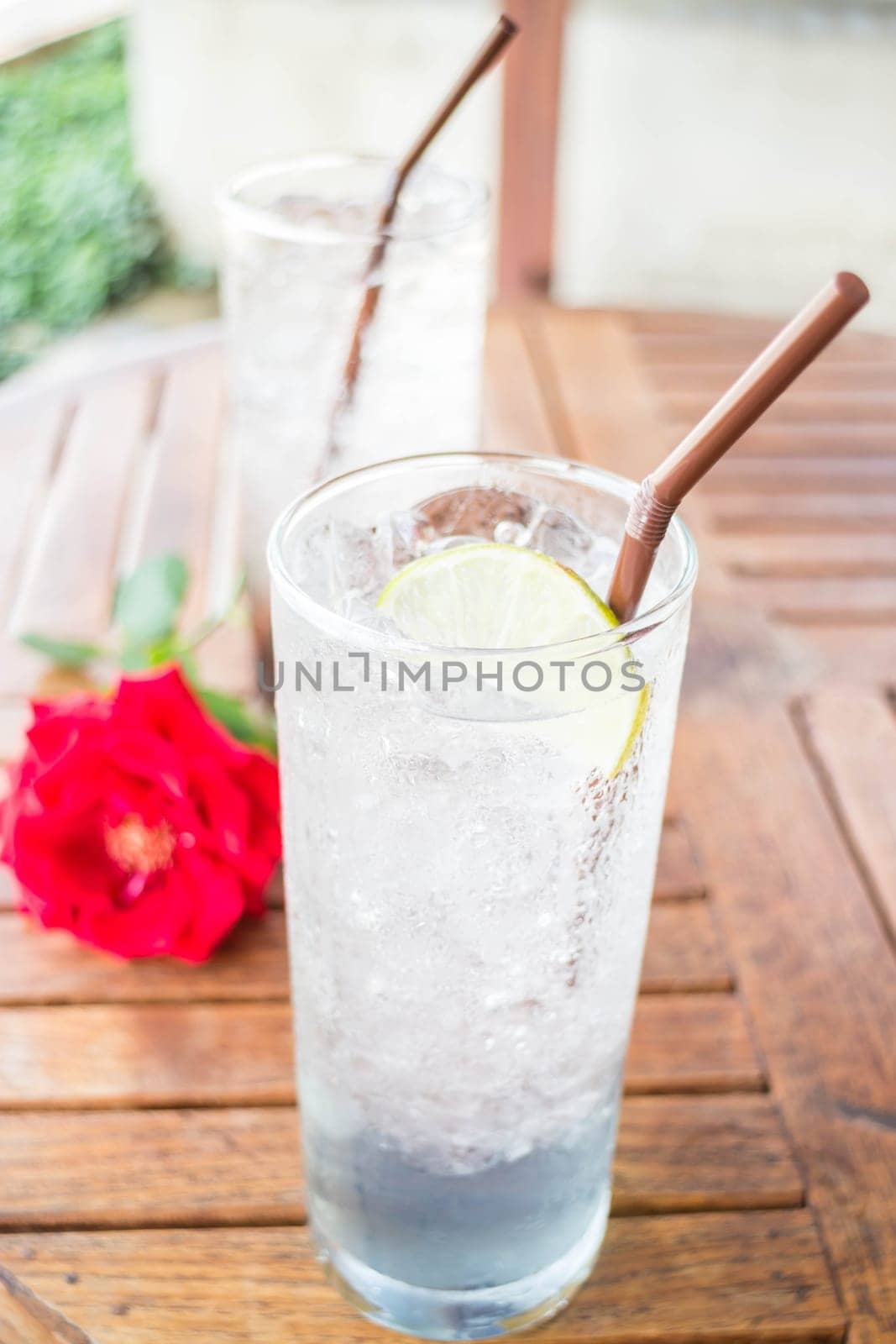 Iced herb drinks serving on wood table, stock photo