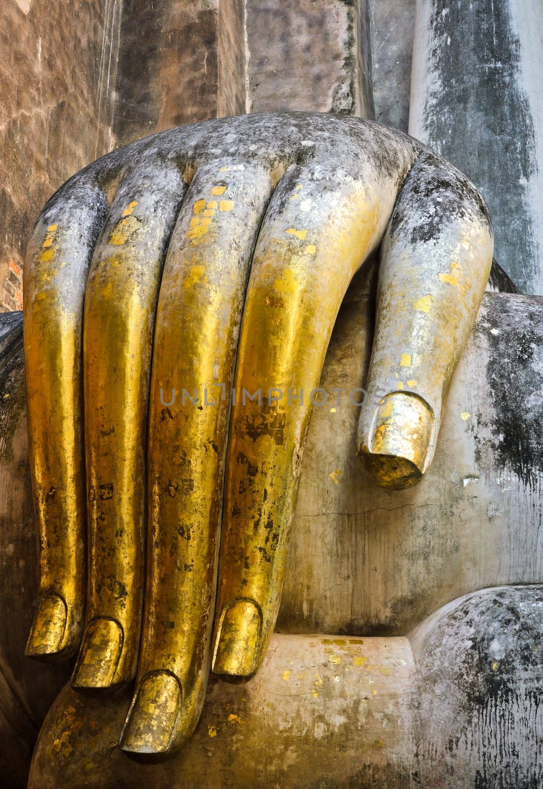 Beautiful hand of big buddha in Sukhothai Historic Park, Thailand
