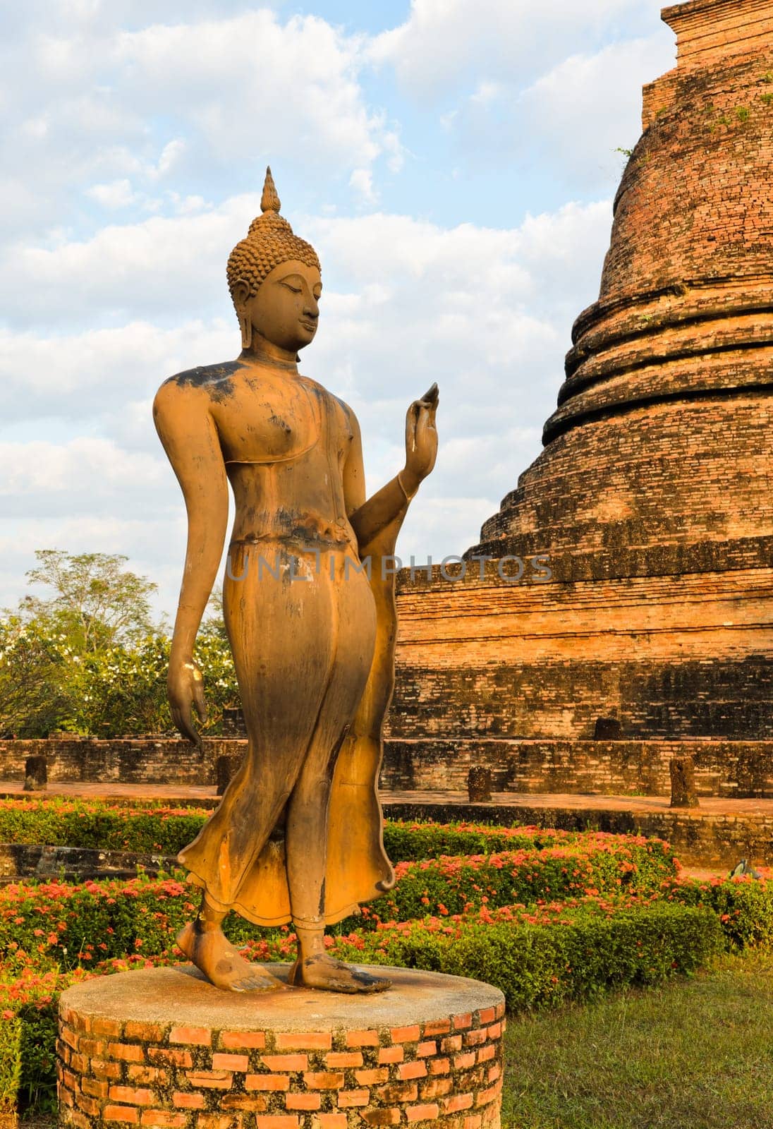 Walking Buddha statue in Sukhothai Historical Park, Thailand