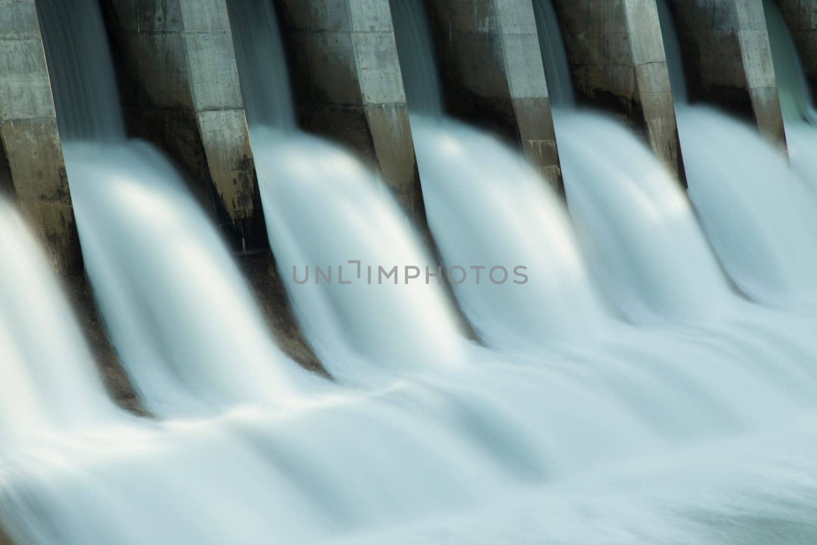 Close up time exposure of the spillway on the Kananaskis hydroelectric dam on the Bow River, Alberta, Canada