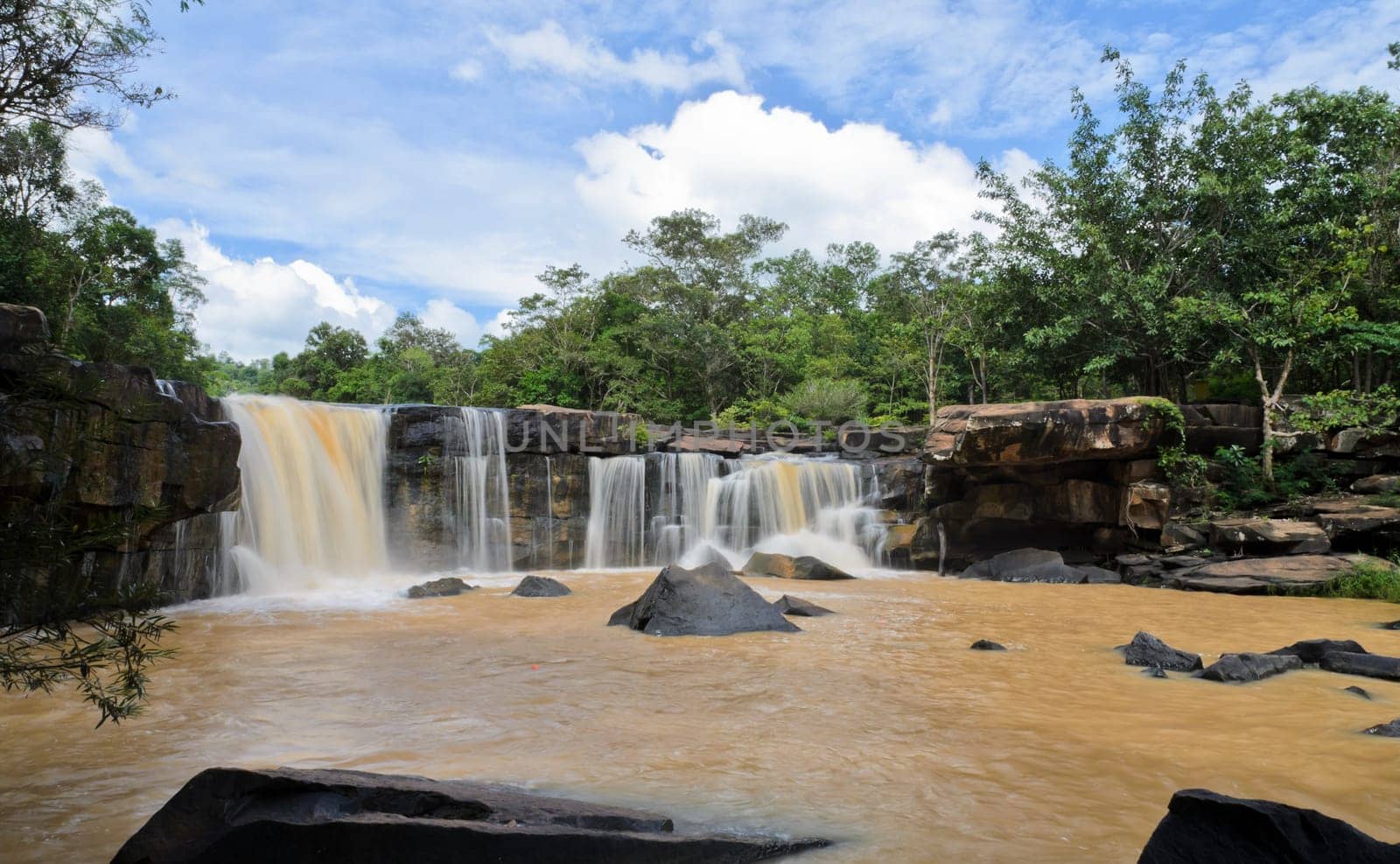Waterfall in dipterocarp forest after heavy rain, Thailand