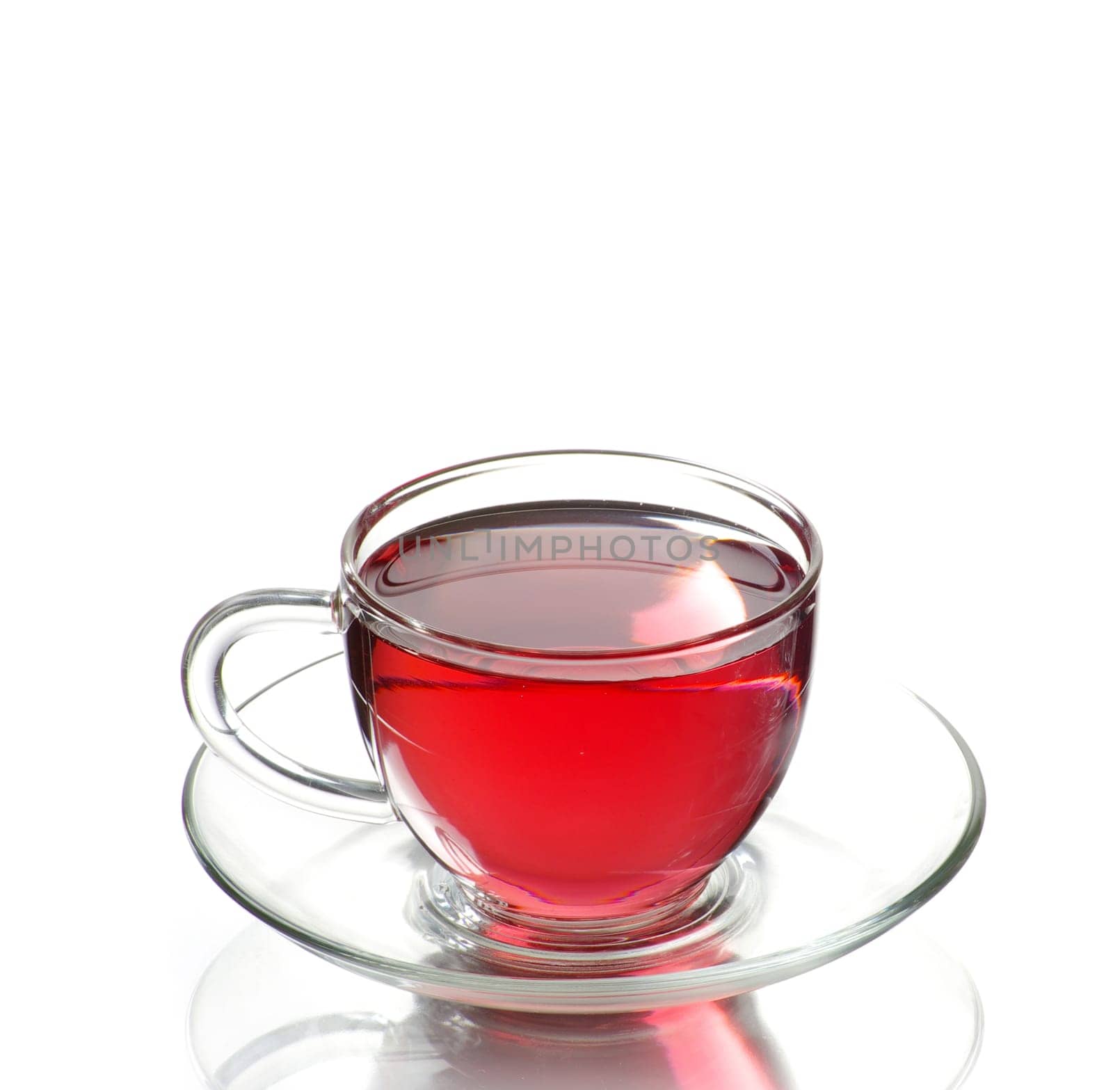 Tea being poured into glass tea cup