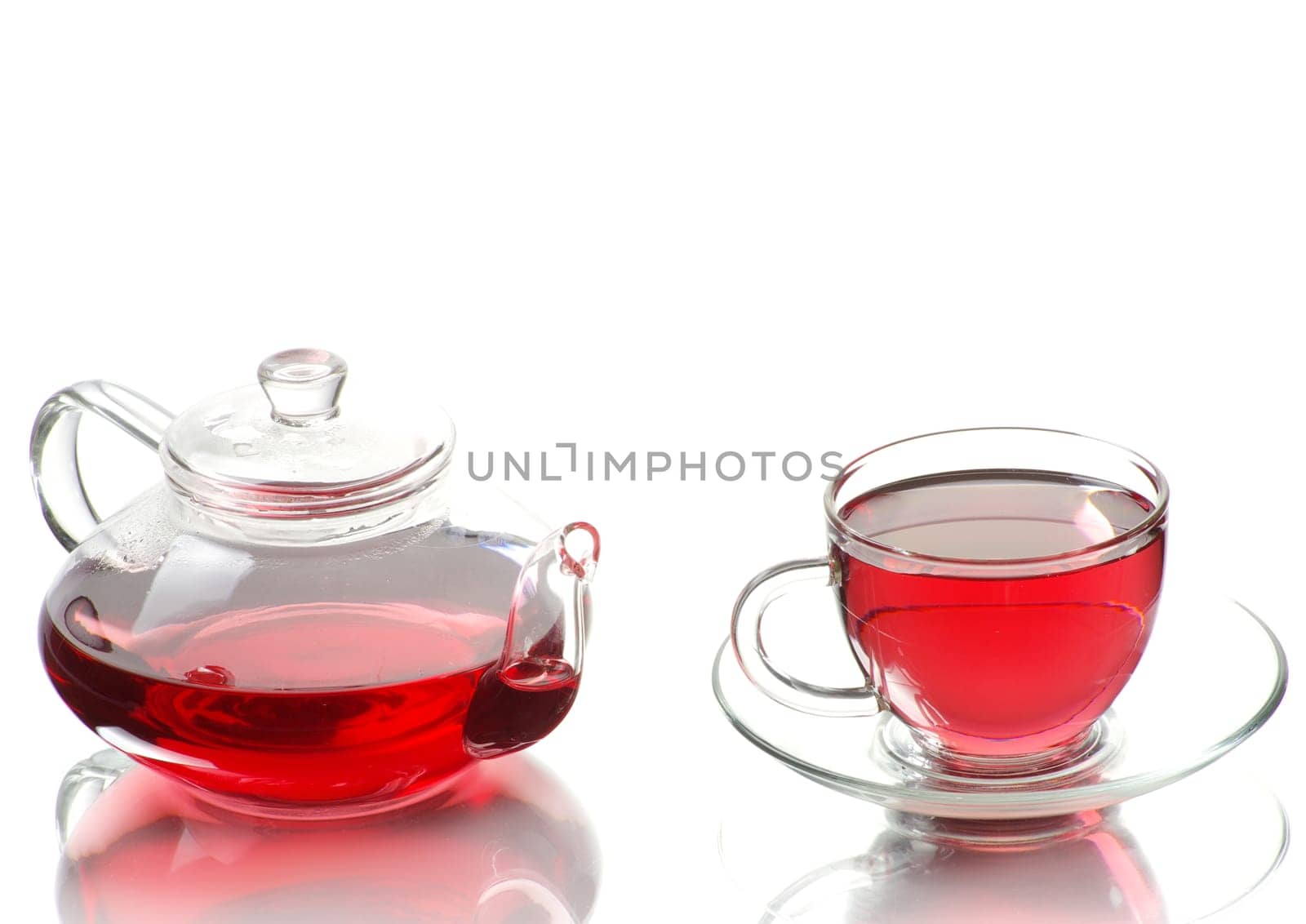 Tea being poured into glass tea cup