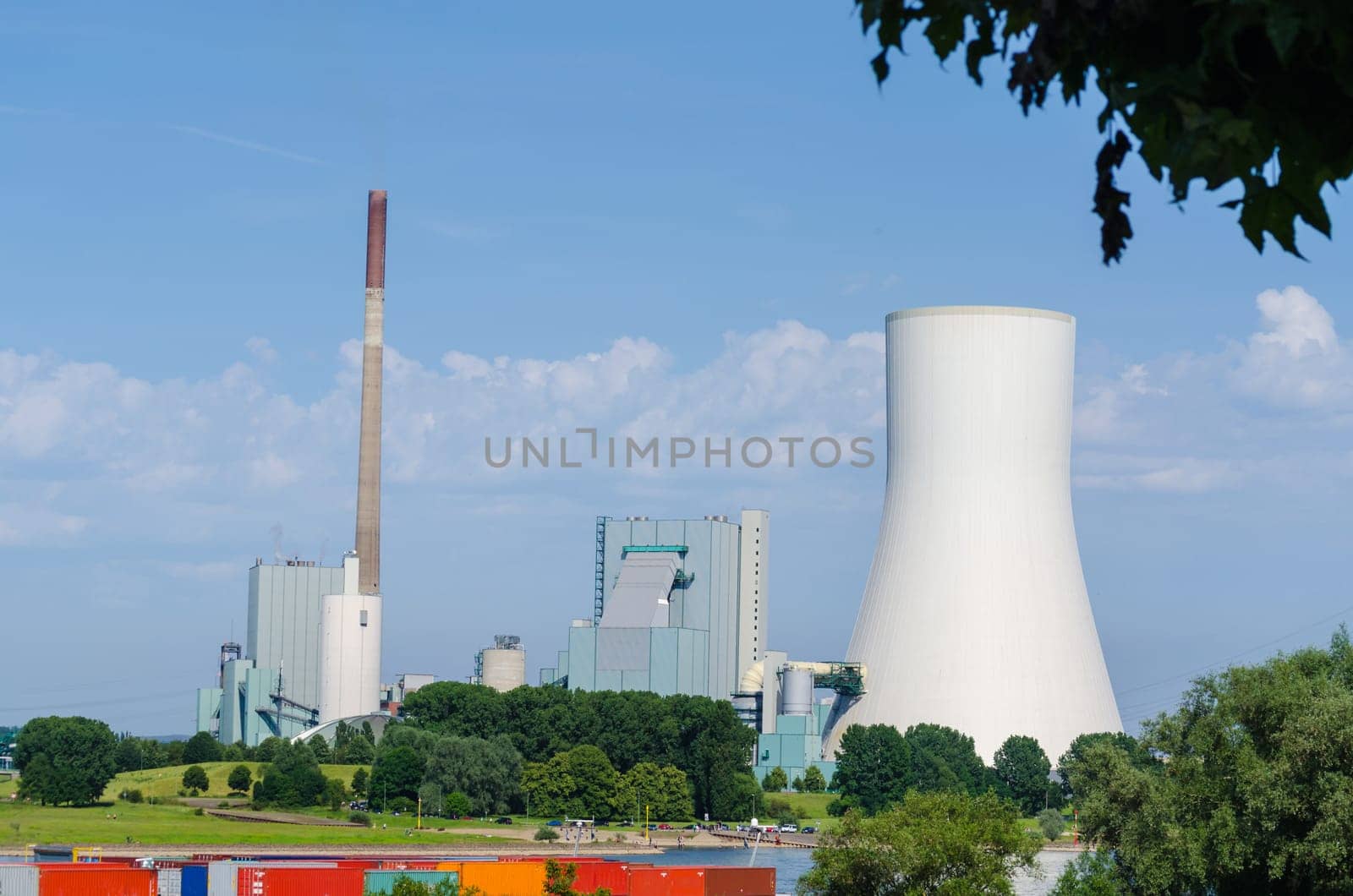 Coal-fired power station on the Rhine opposite the ferry pier in Orsay