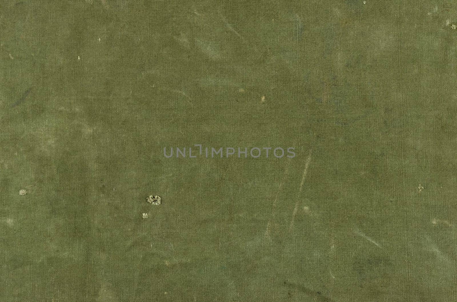Olive green cotton fabric with scratches and holes