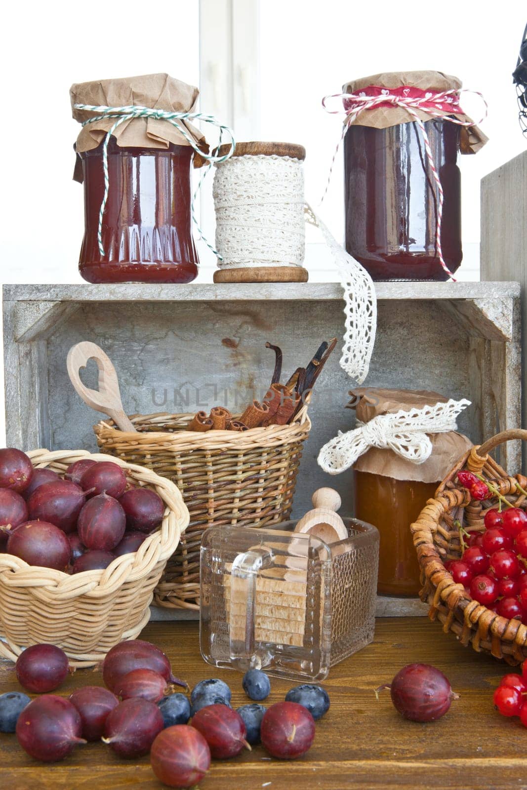 Cook fresh fruit and ingredients for jam