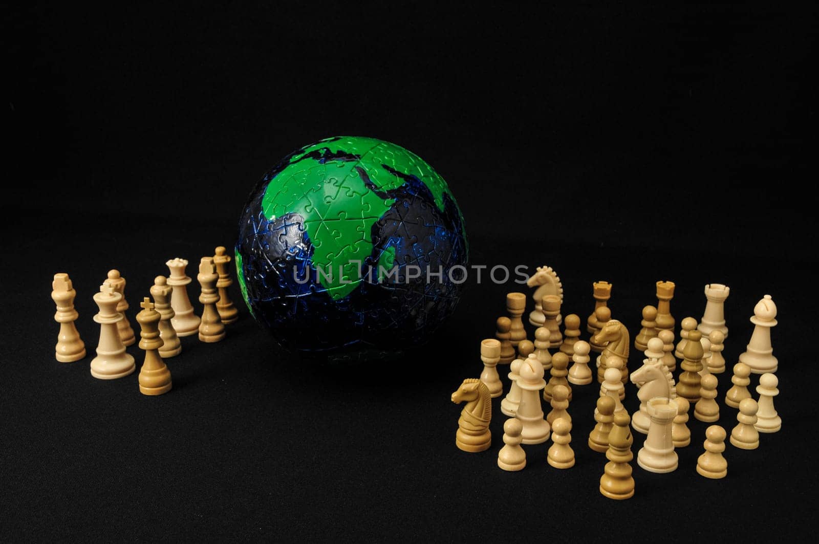 Globe And White Chess on a Black Background