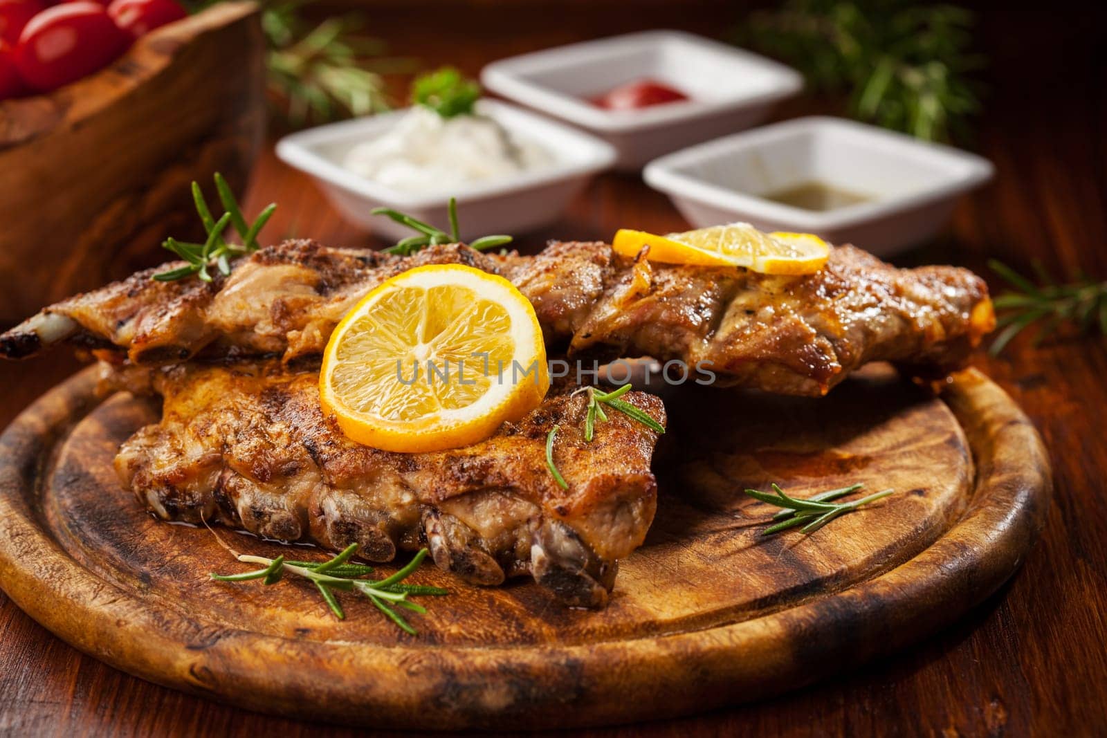 BBQ spare ribs with orange and dips