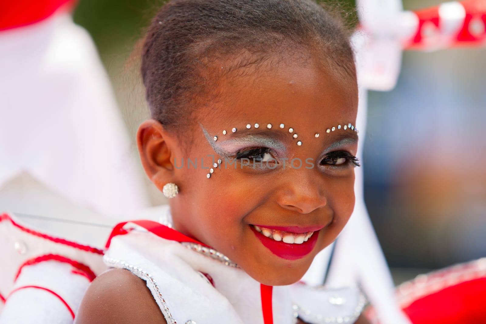 ROTTERDAM, THE NETHERLANDS - JULY 19, 2014, Young carnival dancer at the Summer Carnival street parade in Rotterdam on July 19 in Rotterdam, The Netherlands.