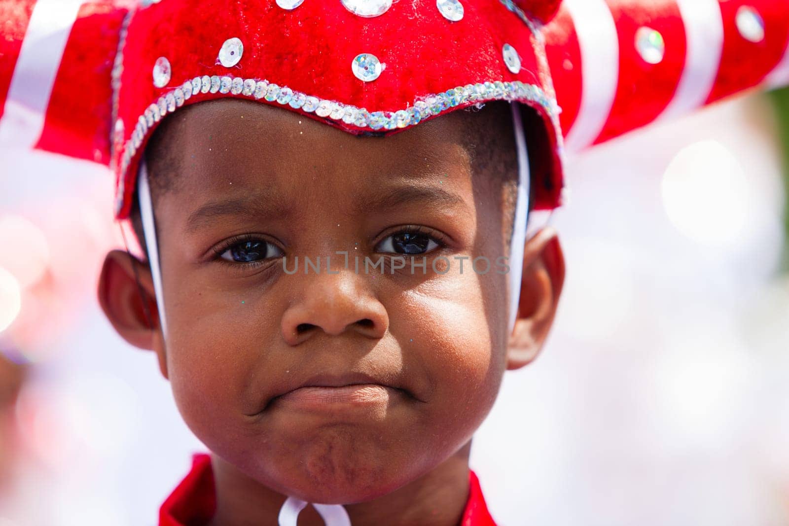 ROTTERDAM, THE NETHERLANDS - JULY 19, 2014, Young carnival dancer at the Summer Carnival street parade in Rotterdam on July 19 in Rotterdam, The Netherlands.