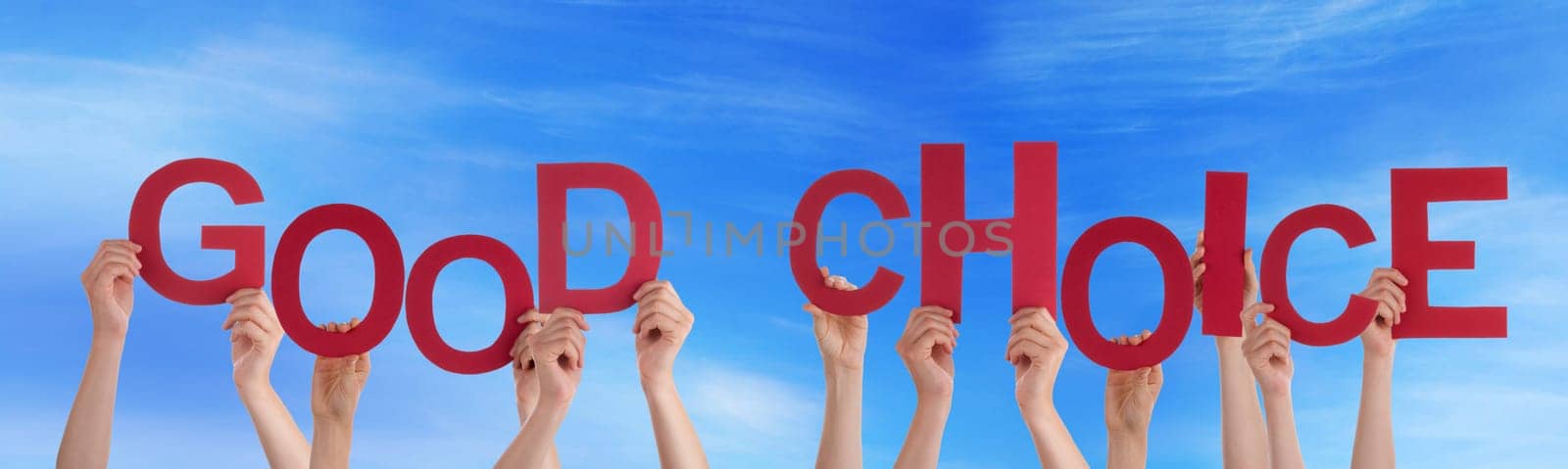 hands holding four pieces of a puzzle with copy space, gray background