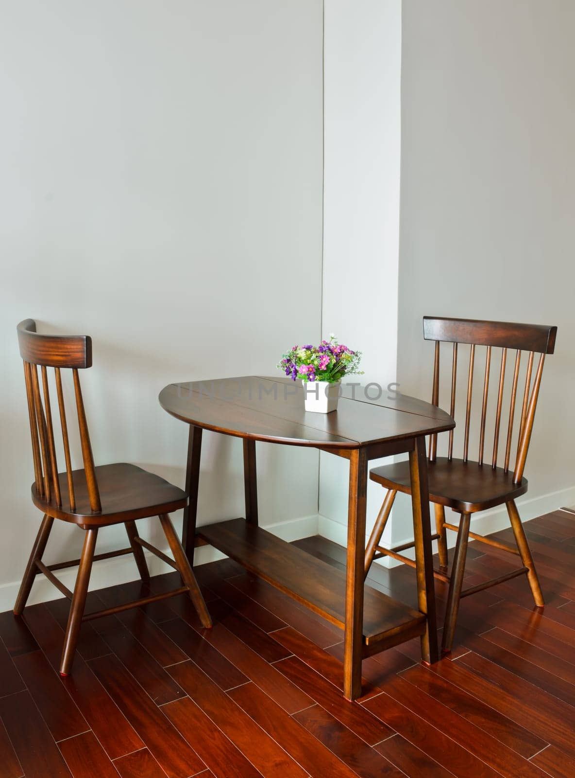 Small dining table with artificial flower pot