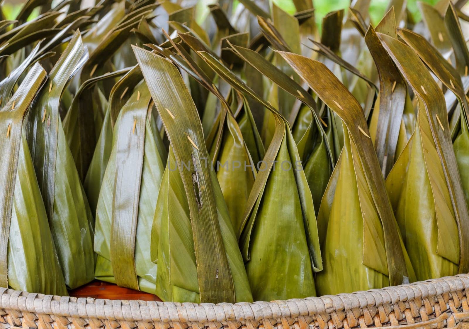 Thai sweet dessert wrapped in banana leaf