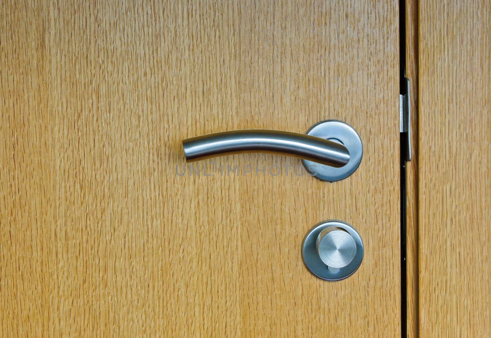Modren style door handle on wooden door