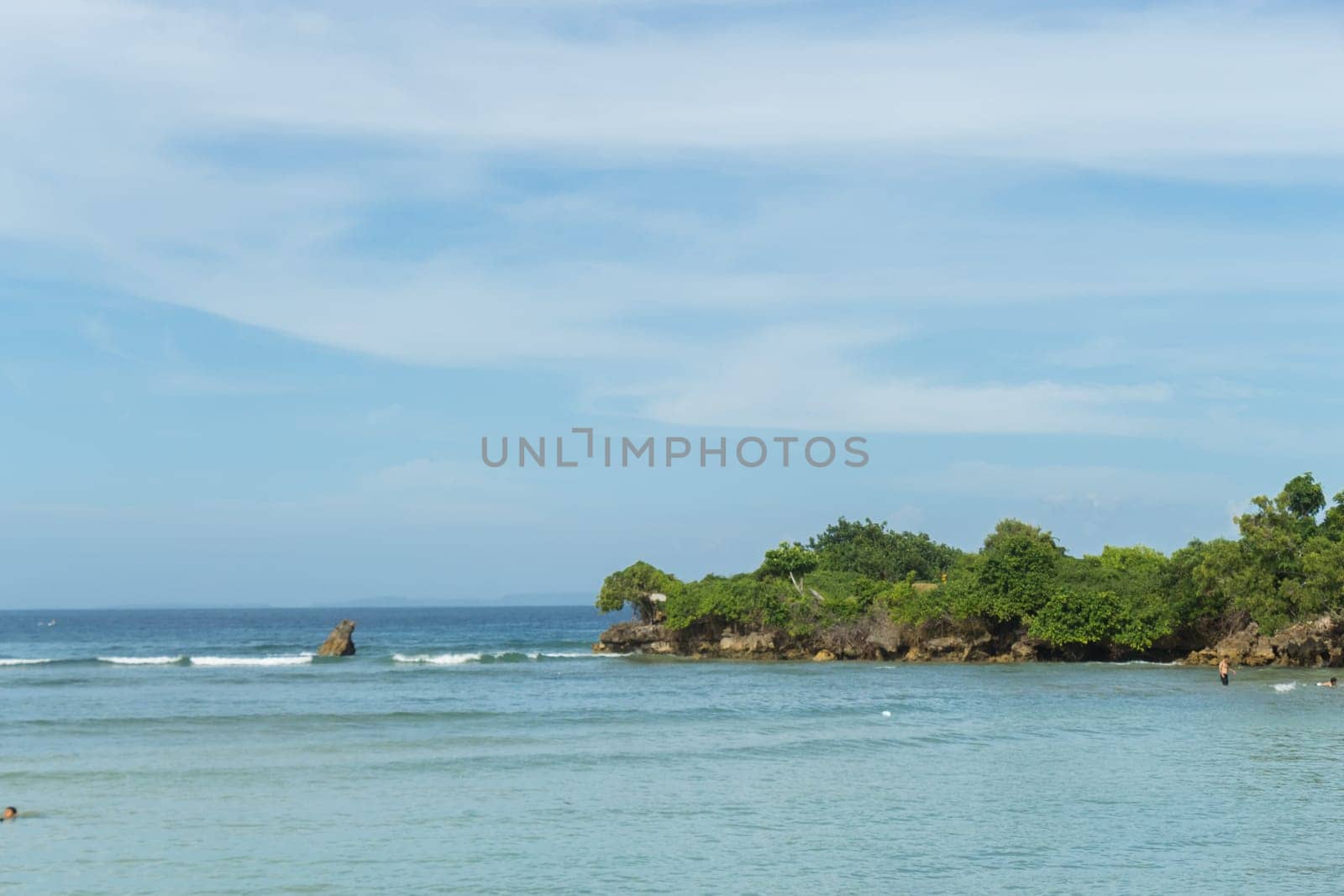 Beautiful secluded sandy beach in the Caribbean with white sand and blue sky as in paradise