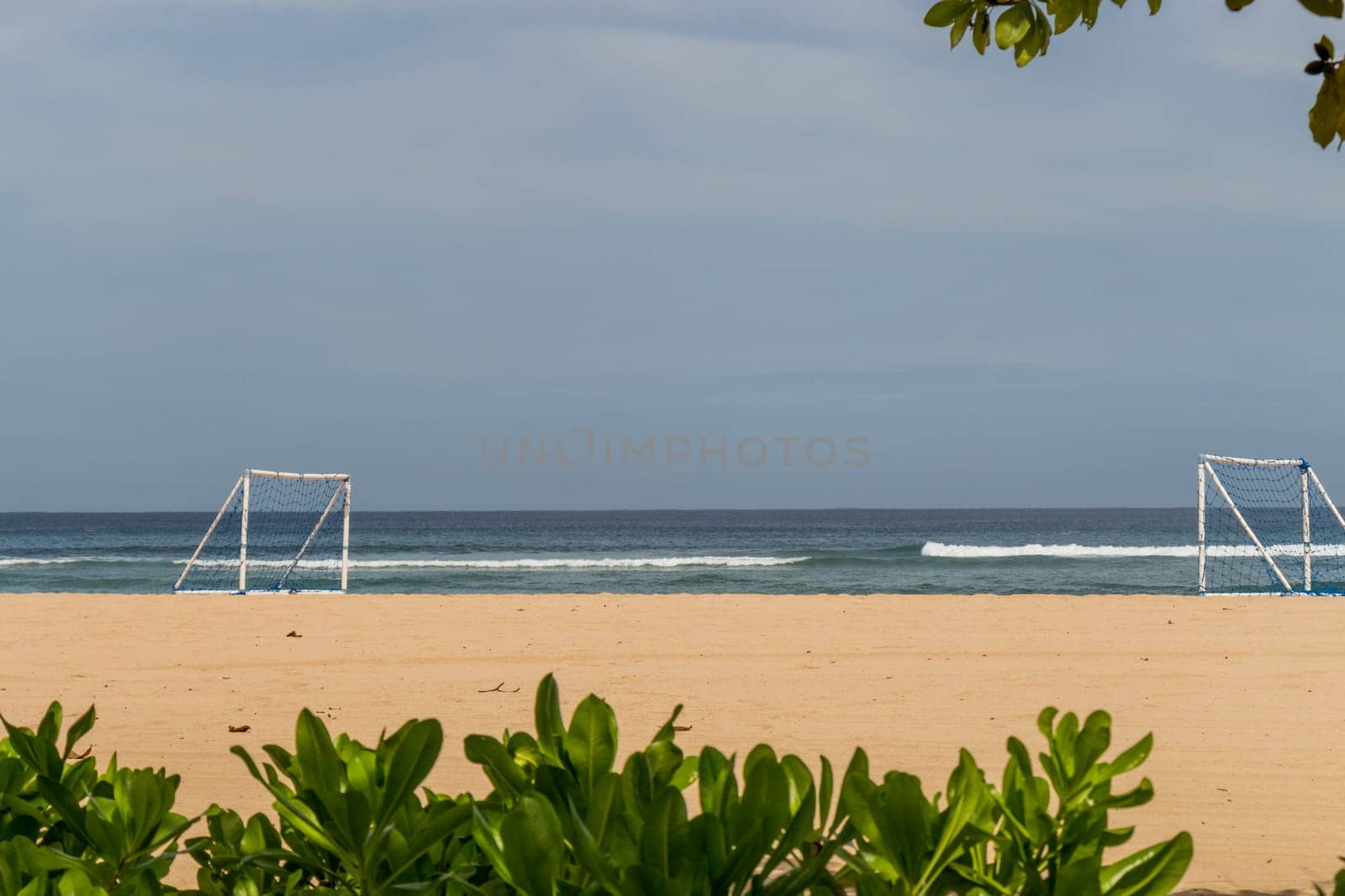 Beautiful secluded sandy beach in the Caribbean with white sand and blue sky as in paradise