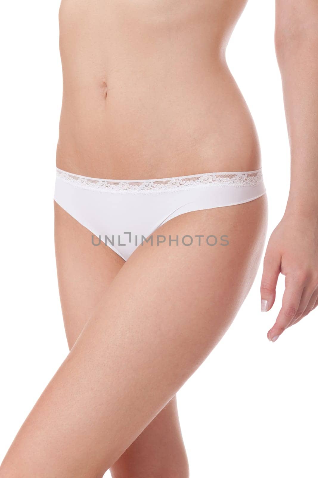 attractive sexy woman's body in white underwear with briefs and bra insulated against white background