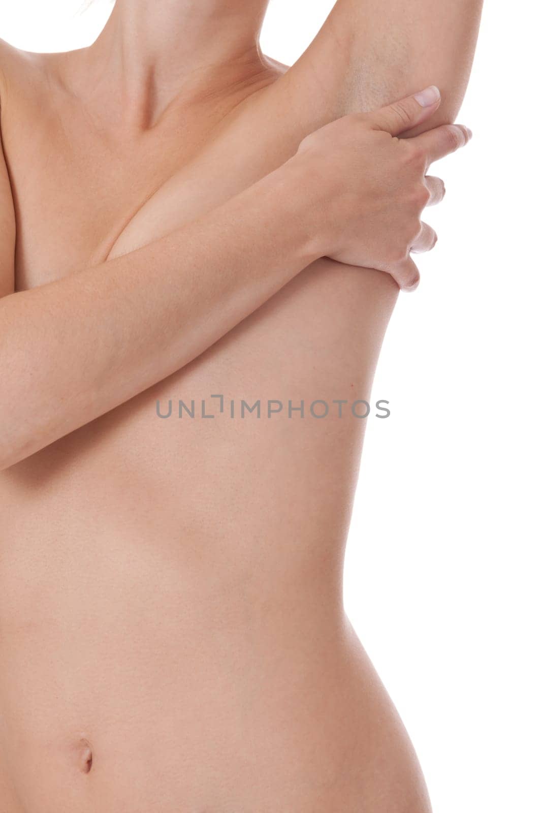 Cutout of a naked woman's body with concealed chest isolated against a white background for wellness and health