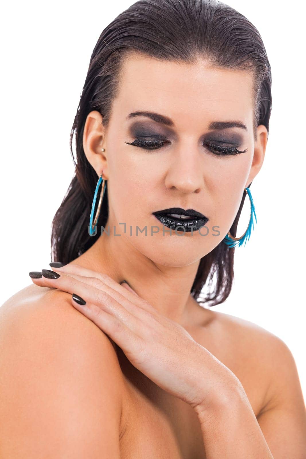 attractive young woman with black hair blue eyes and black makeup lips nail polish portrait