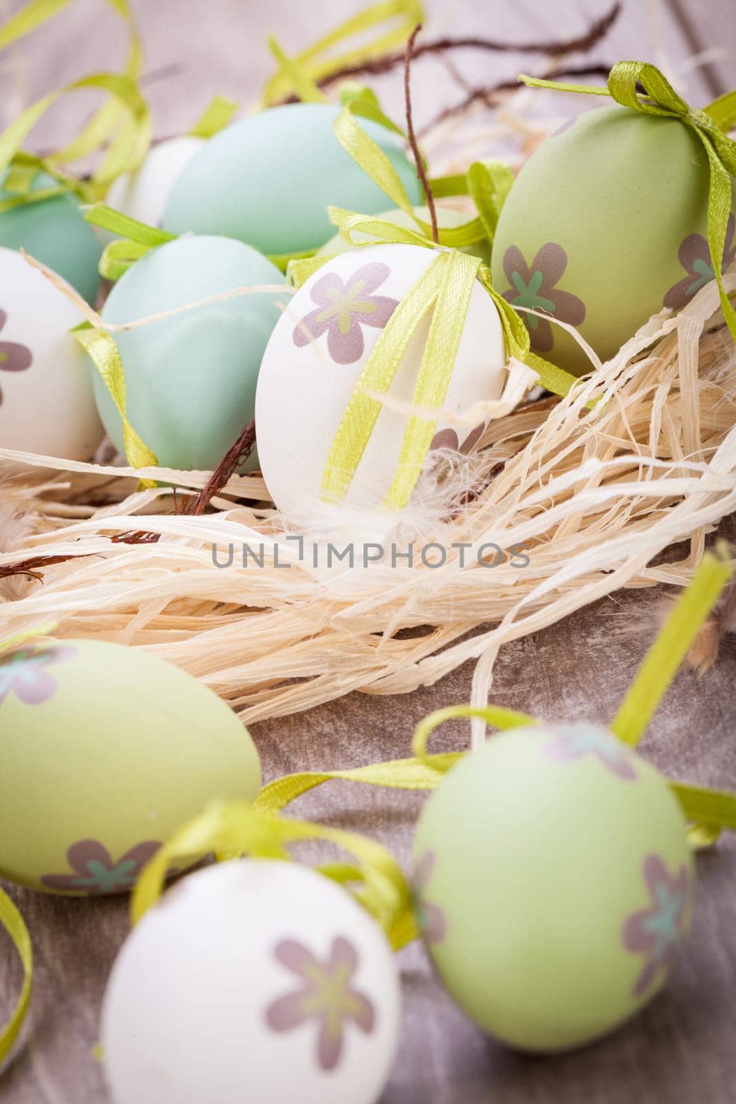 colorful green painted easter egg decoration easter bruse festive wooden table