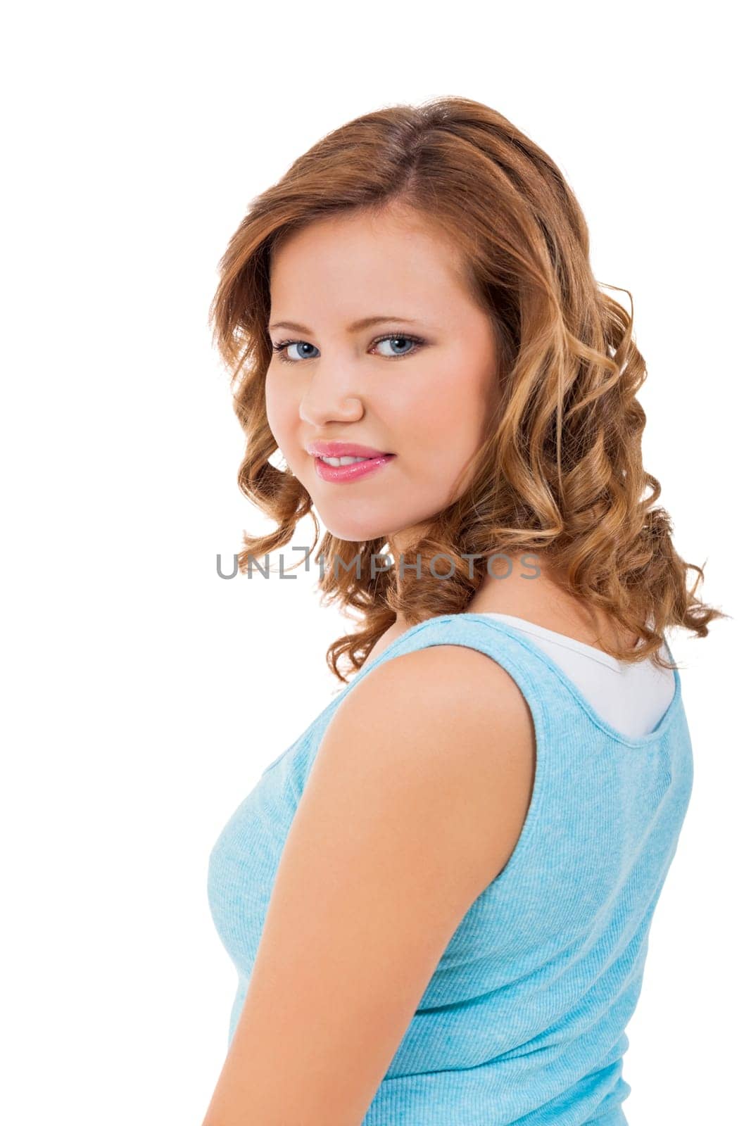 Blonde girl teen with blue eyes and blue shirt laughing portrait isolated