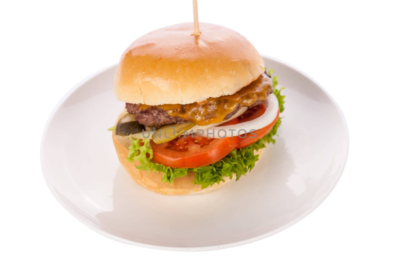 Delicious hamburger cheeseburger with bacon egg and salad on a plate isolated on a white background