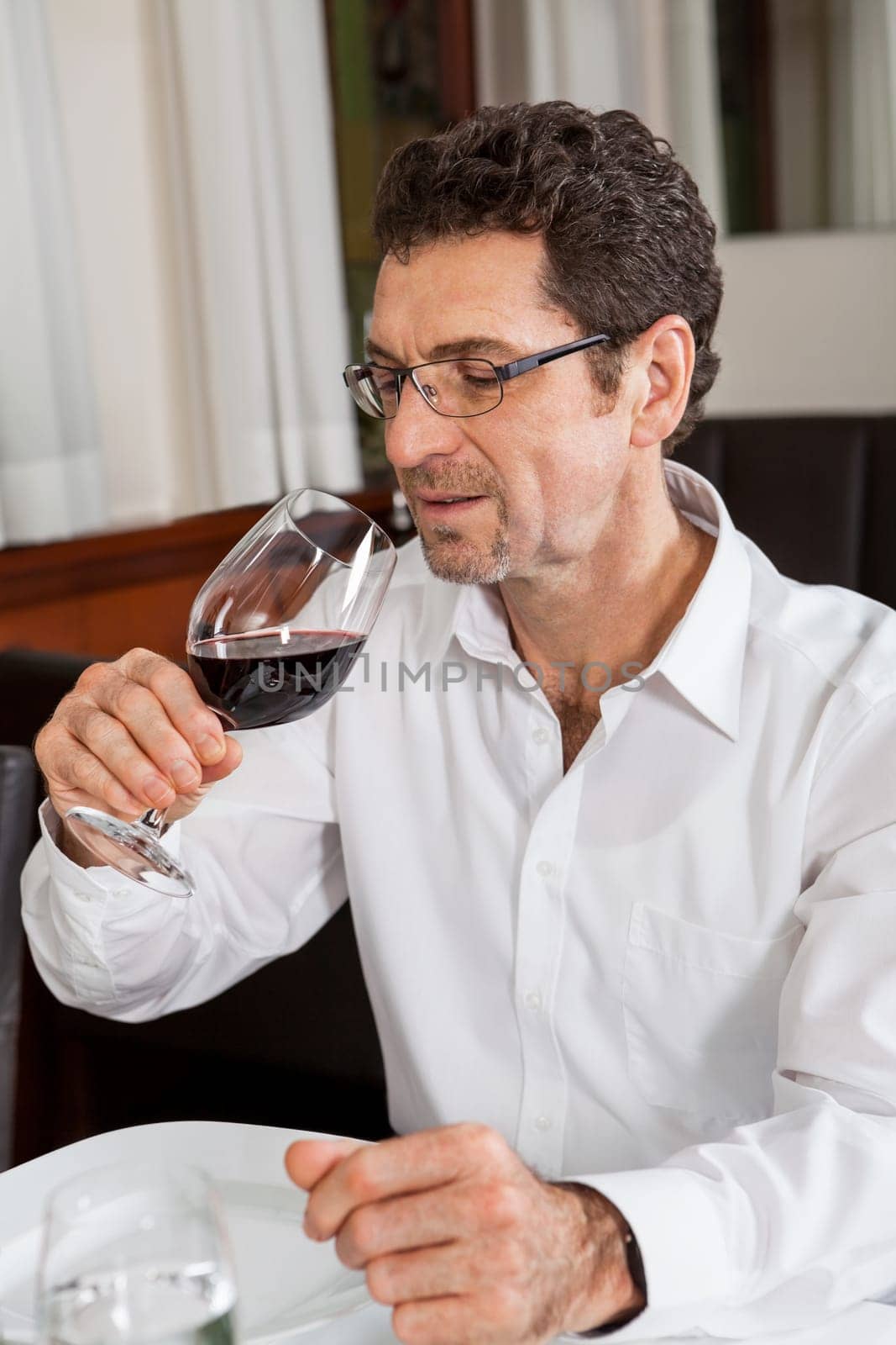Young couple group in a restaurant cheerful while drinking
