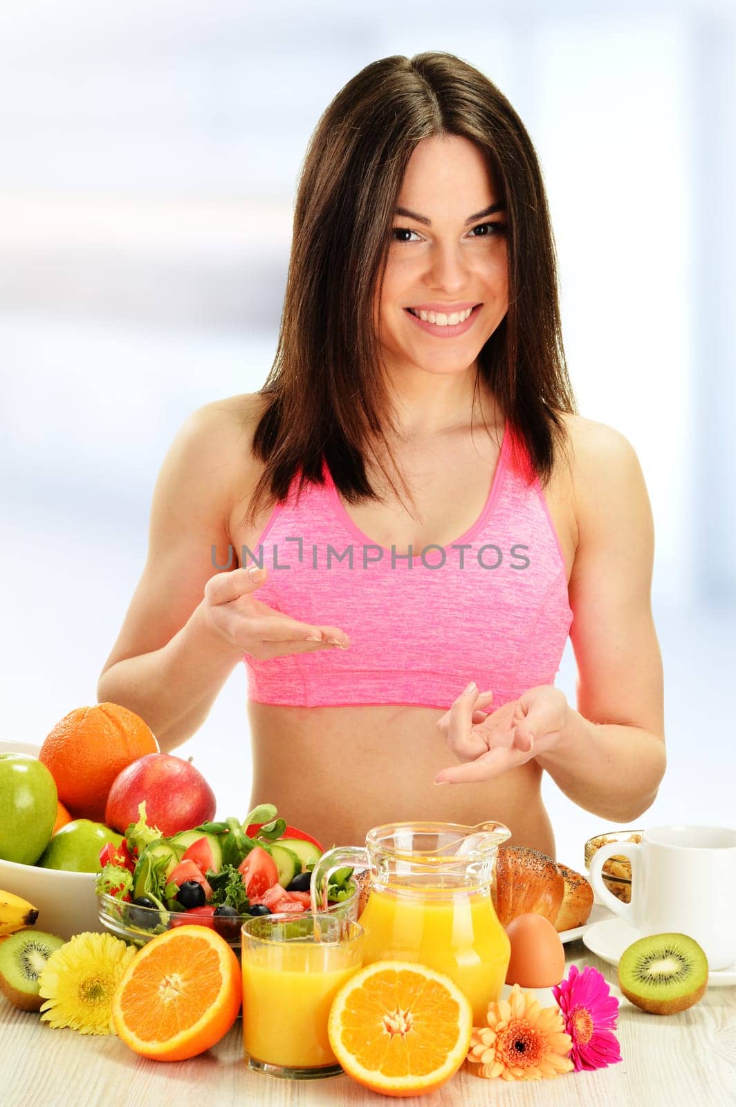 Young woman having breakfast. Balanced diet.