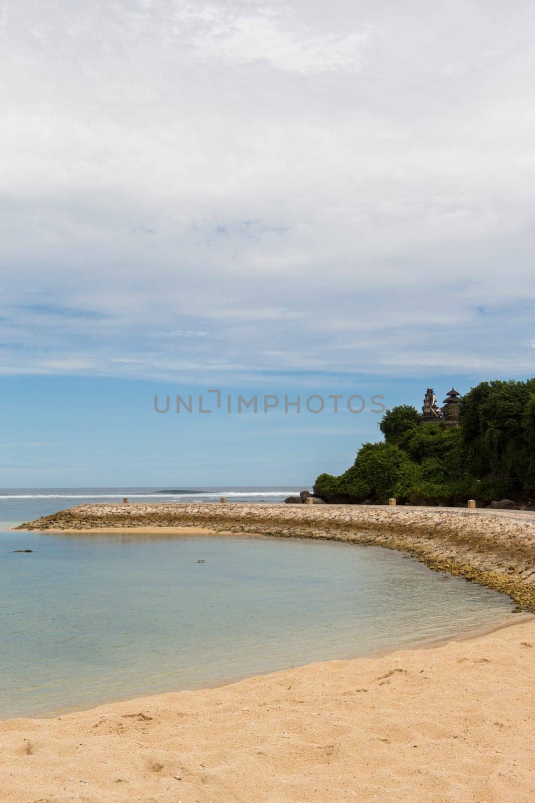 Beautiful secluded sandy beach in the Caribbean with white sand and blue sky as in paradise