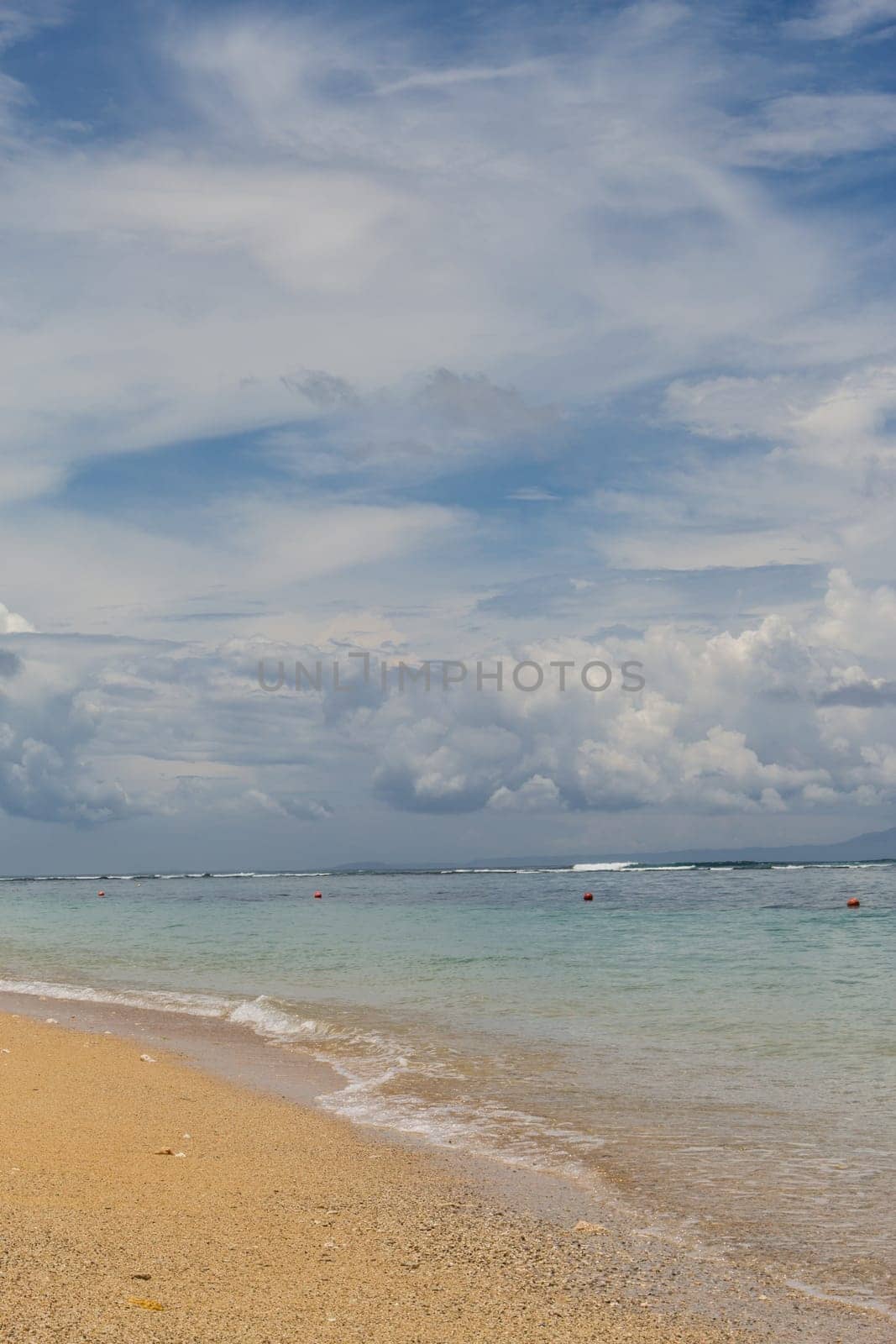 Beautiful secluded sandy beach in the Caribbean with white sand and blue sky as in paradise