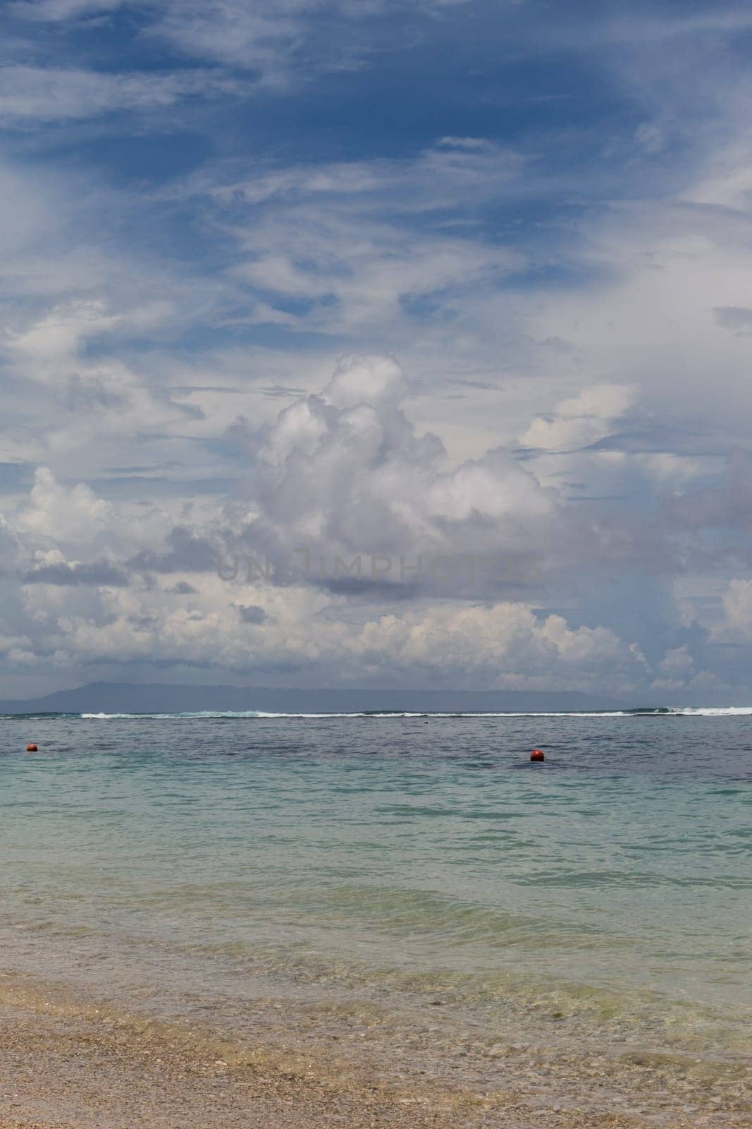 Beautiful secluded sandy beach in the Caribbean with white sand and blue sky as in paradise