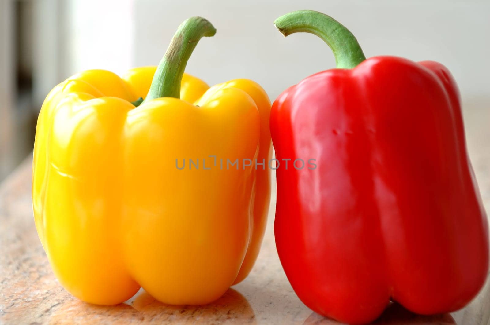 The close up picture of yellow and red paprica