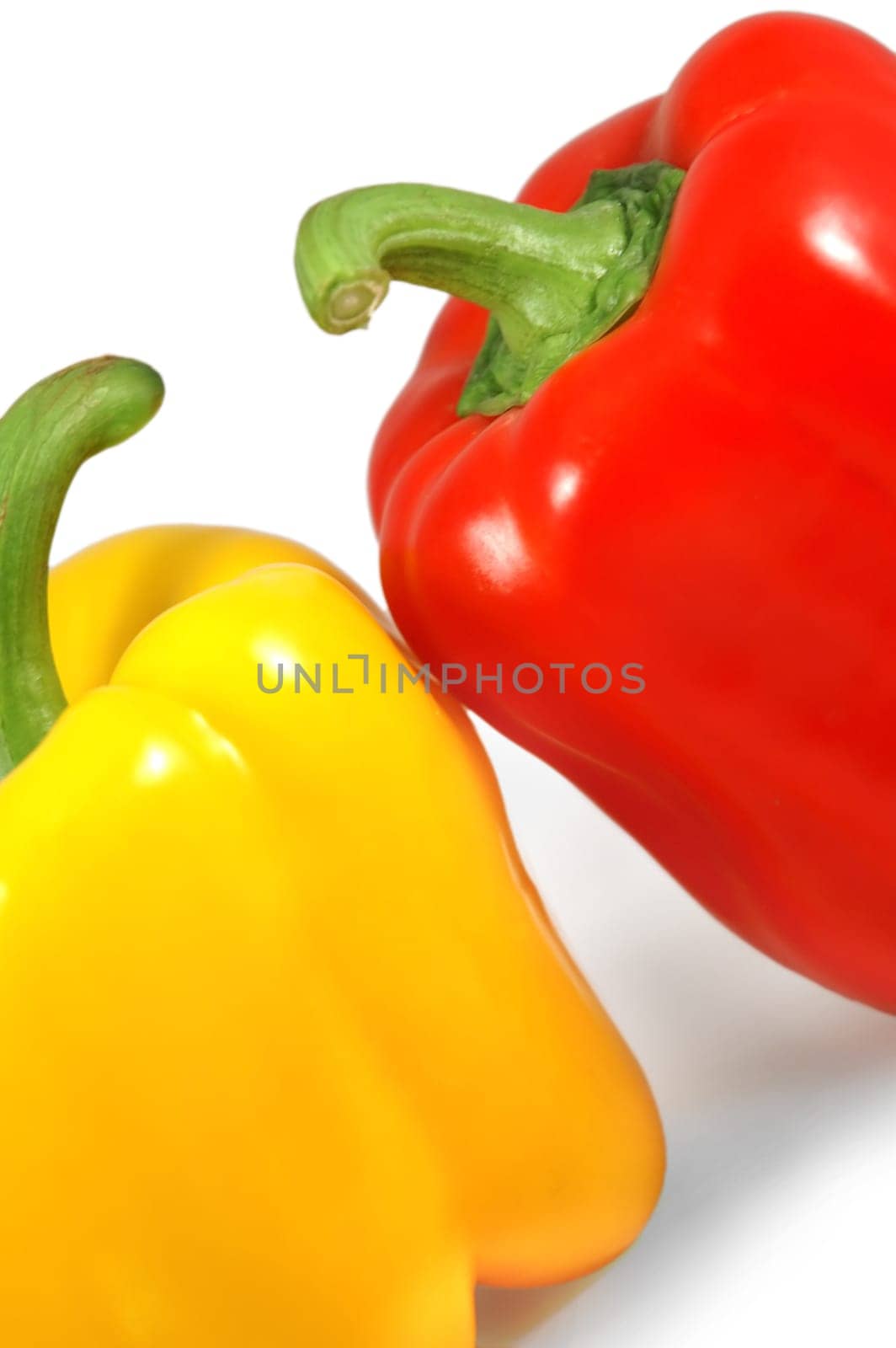 The close up picture of isolated papricas over white