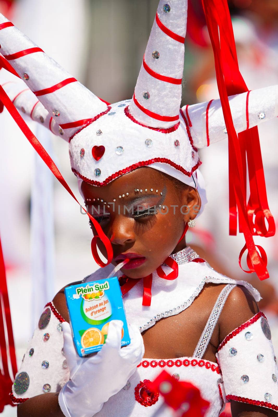 Rotterdam, the Netherlands - July 19, 2014, Young carnival dancer in the parade at the Caribbean Carnival in Rotterdam on July 19 in Rotterdam, The Netherlands.