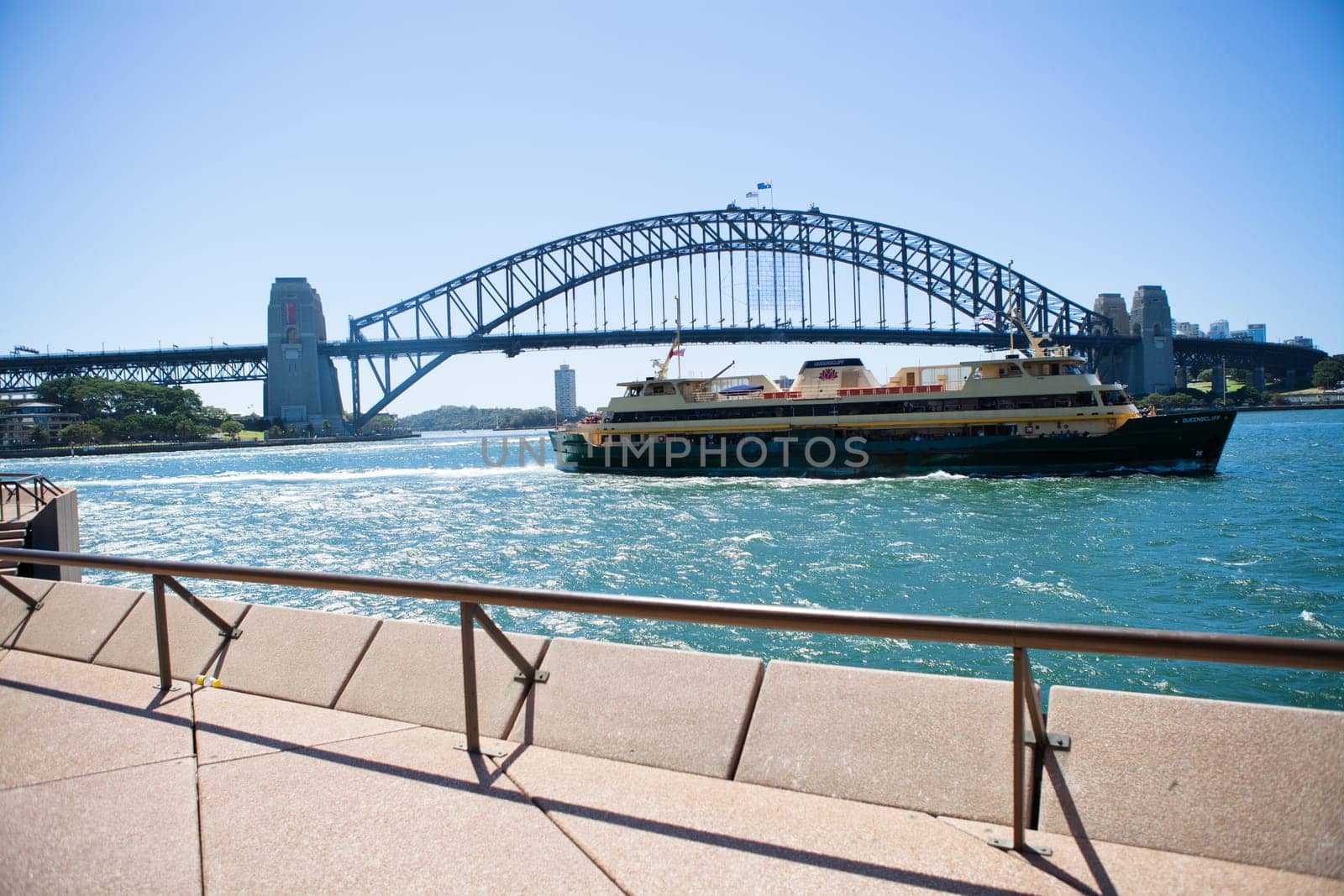 View from Opera House of Manly ferry with Sydney Harbour Bridge in background