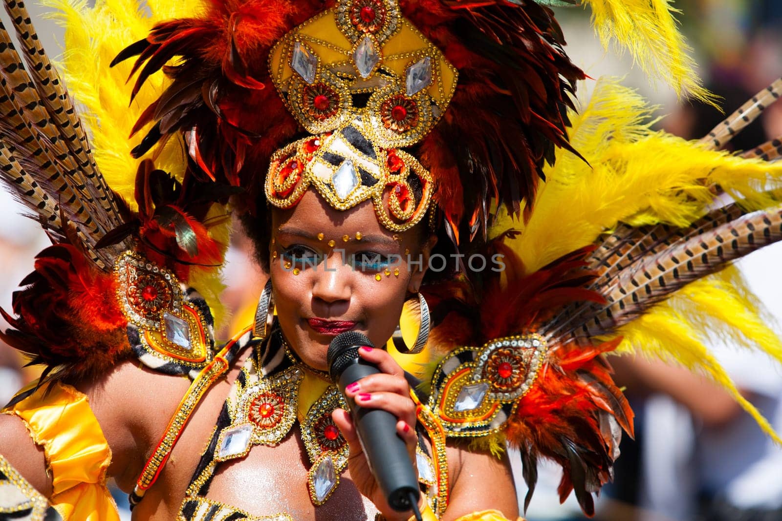 ROTTERDAM, THE NETHERLANDS - JULY 19, 2014, Carnival dancer at the Caribbean Carnival street parade on July 19 in Rotterdam, The Netherlands.