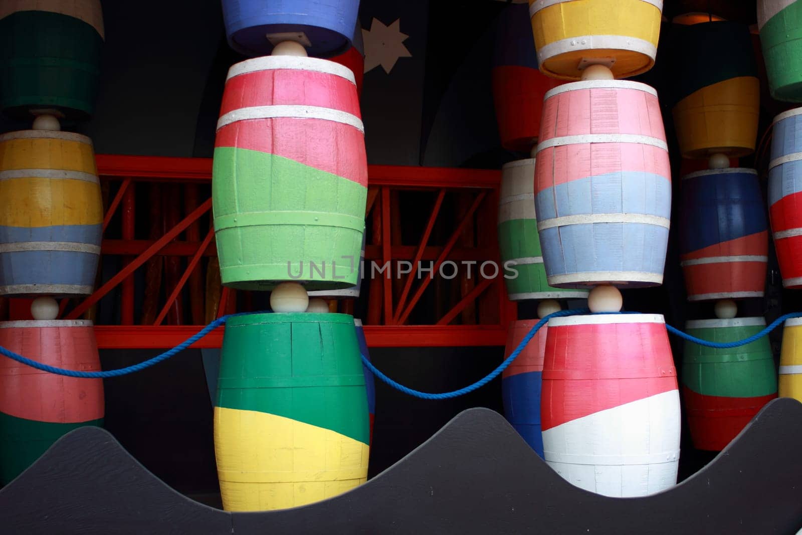 Colorful barrels at funhouse in fairground