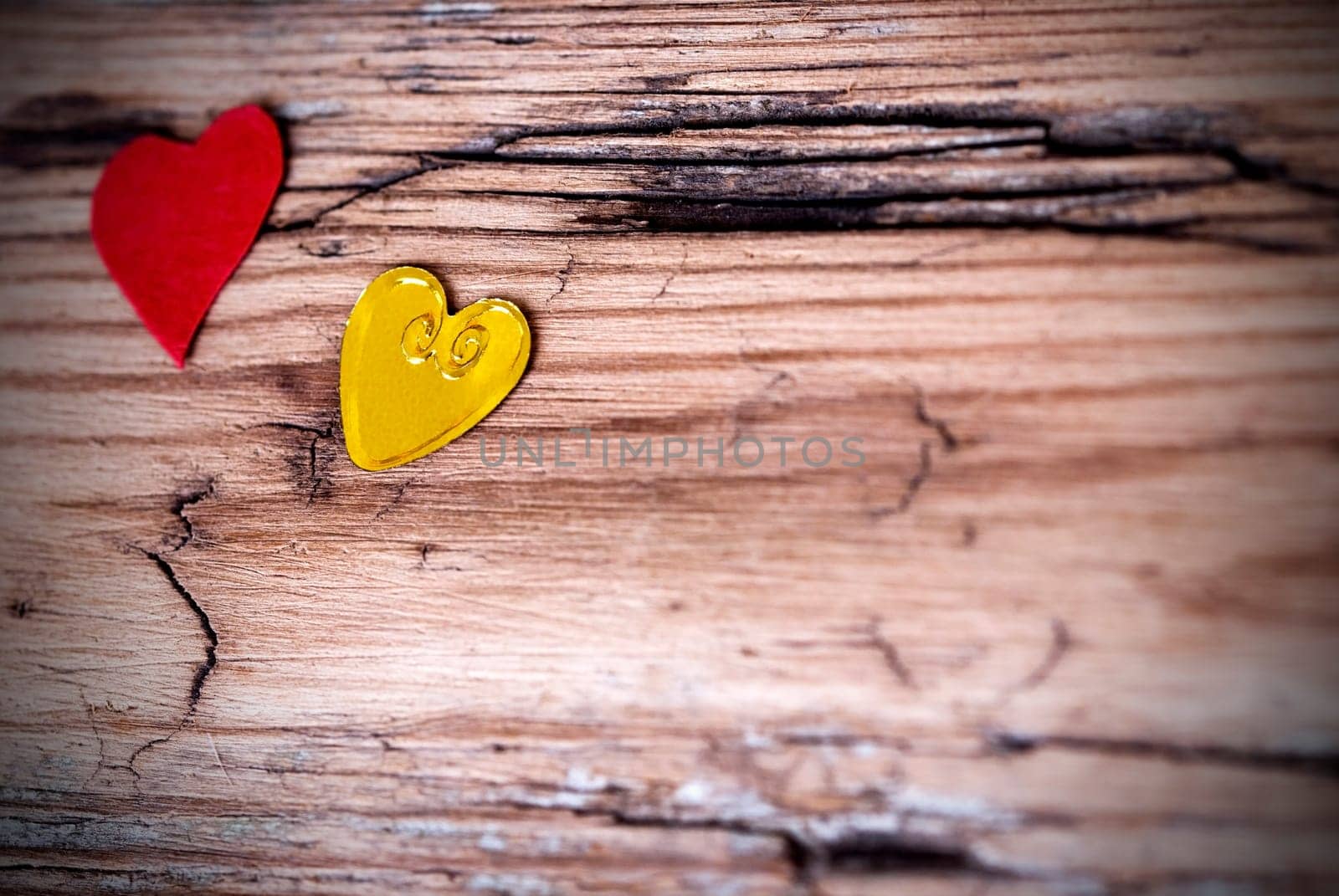 Heart Background with Two different Hearts on a Wooden Plank