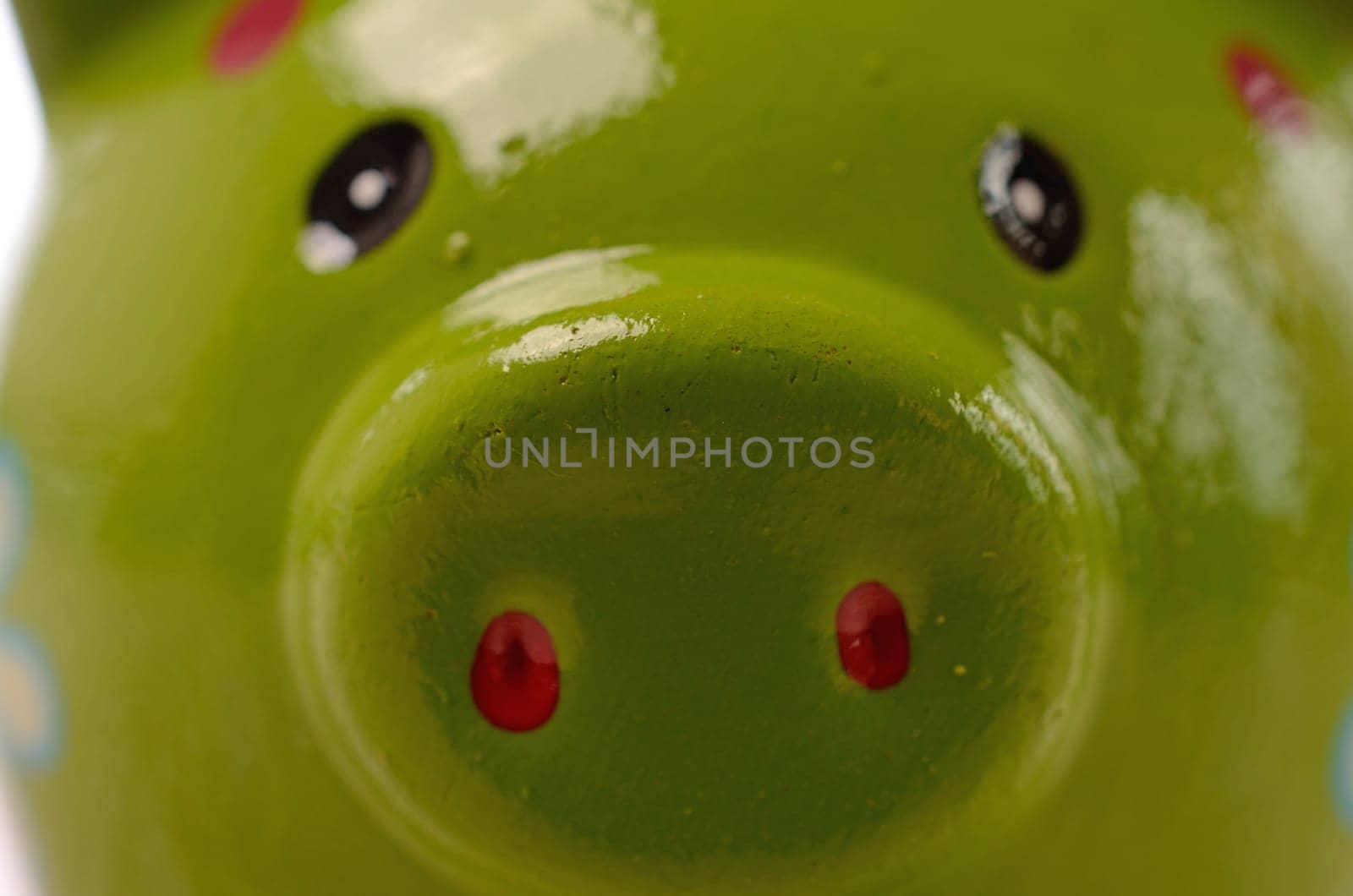 Closeup of a green piggy bank