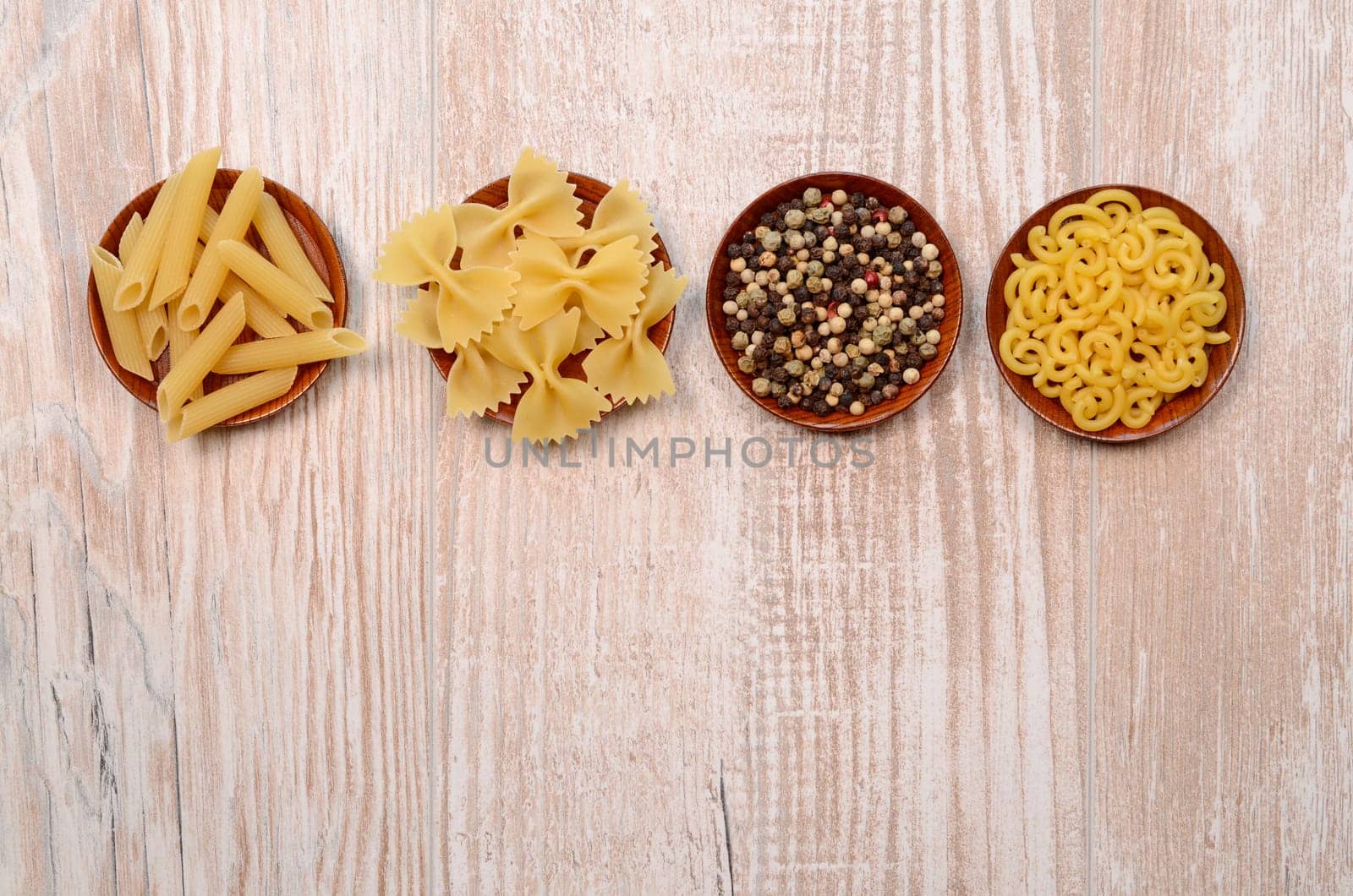 Pasta ingredients on a wooden table