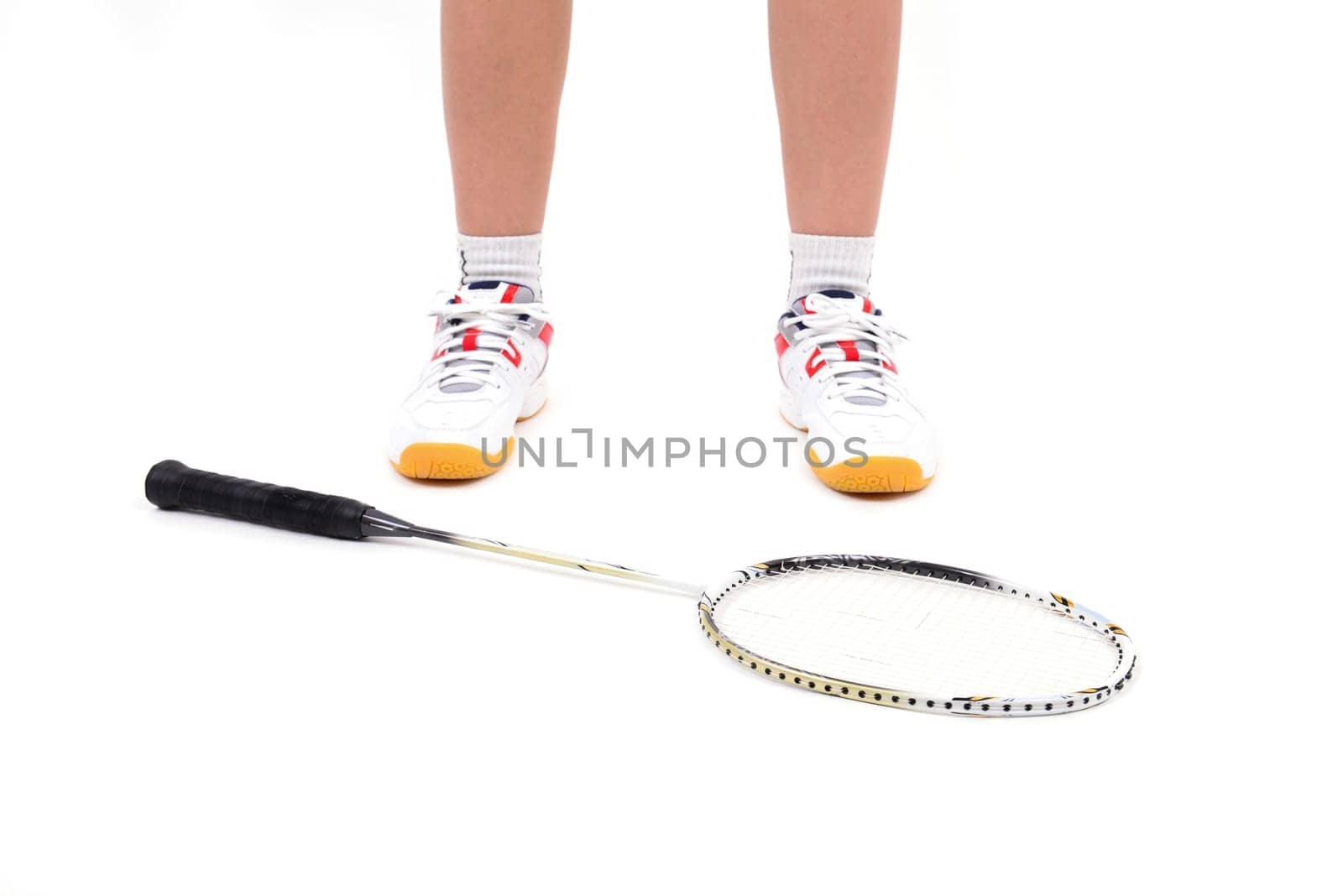 badminton player in action isolated on white background