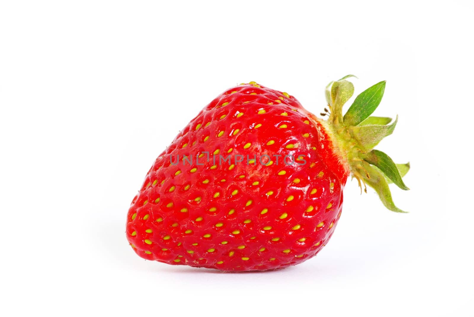 The strawberry isolated over white